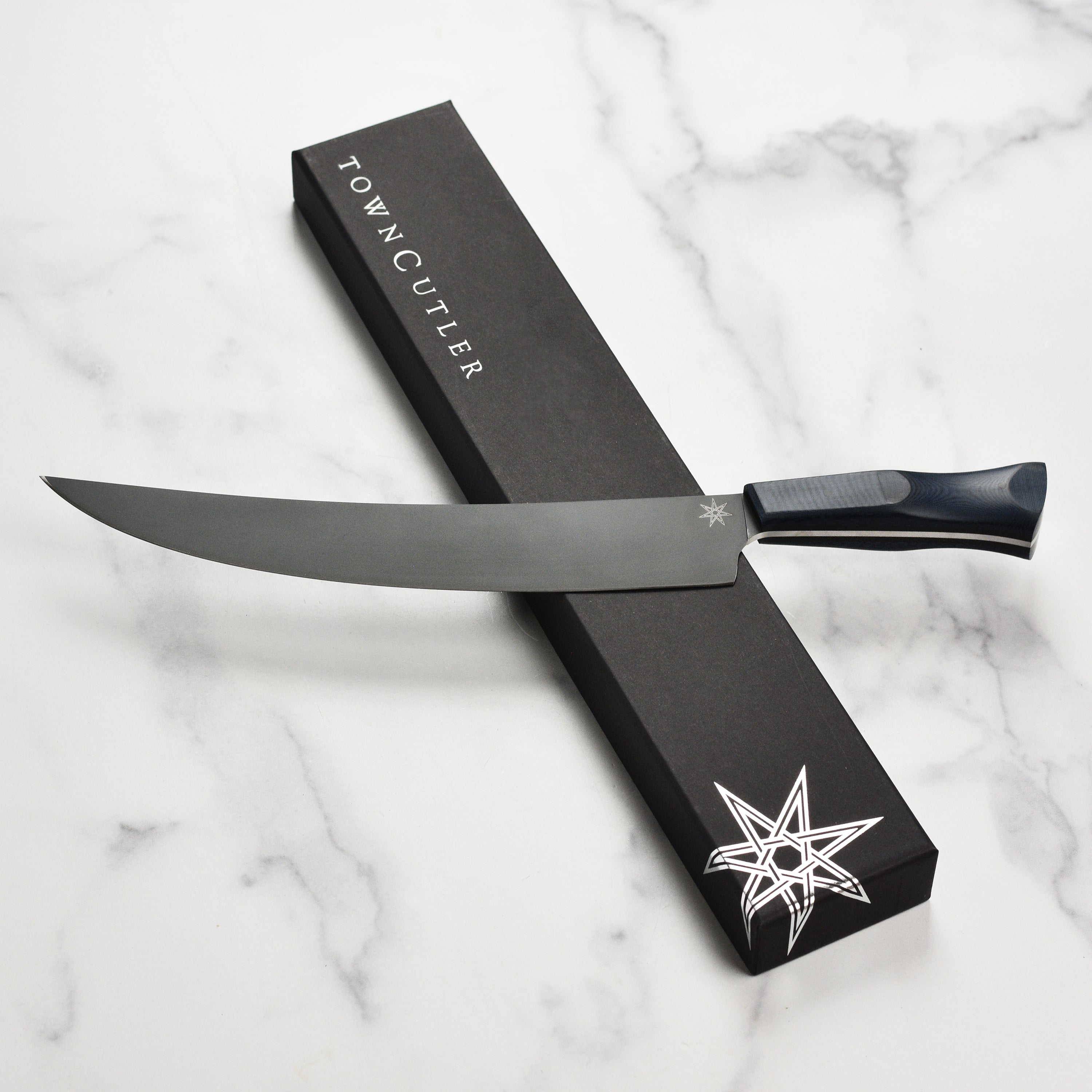 Town Cutler eXo Blue 11-inch scimitar knife with blue handle and stainless steel blade, ready for meat slicing