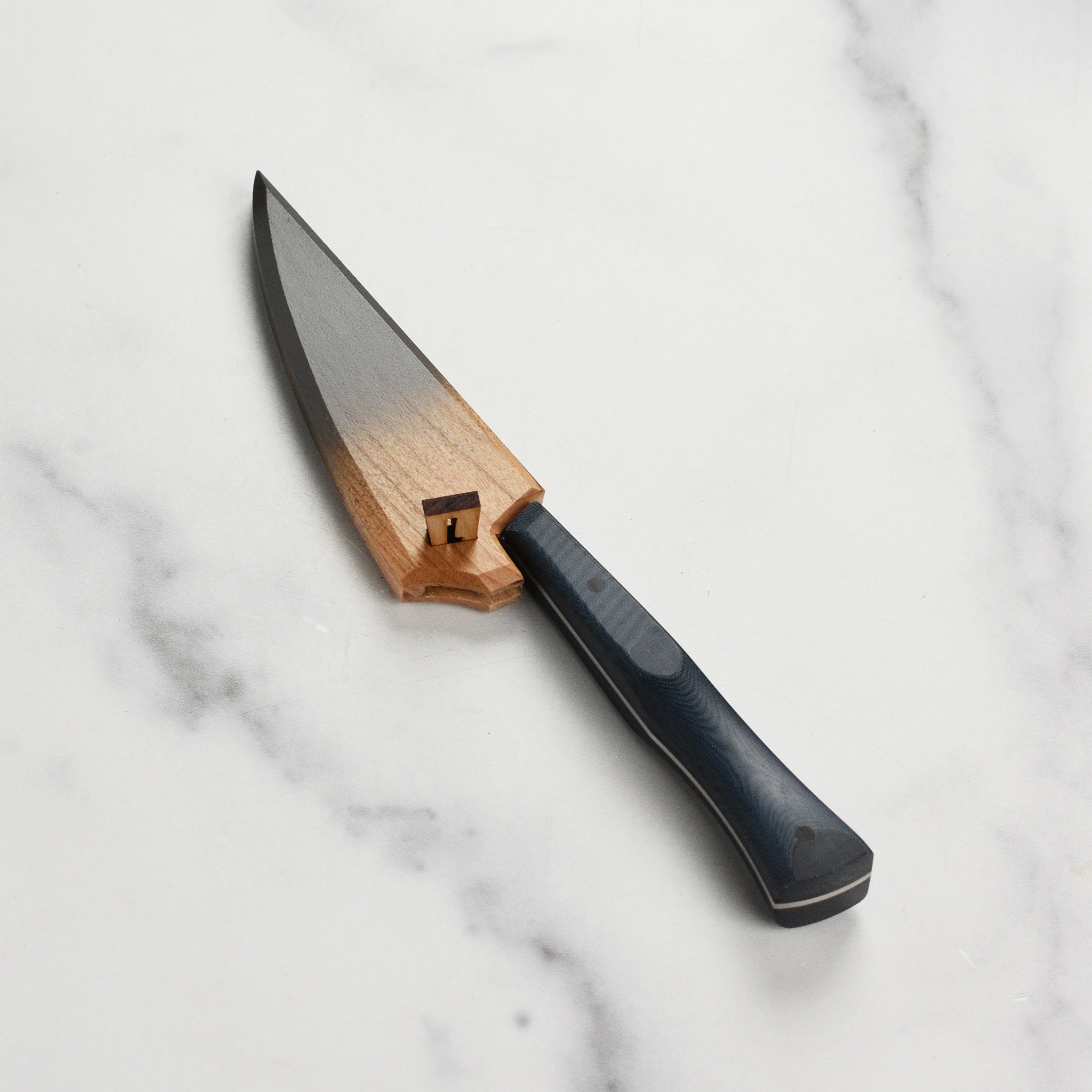 Elegant blue saya showcasing the Town Cutler 3" paring knife with cherry wood design.