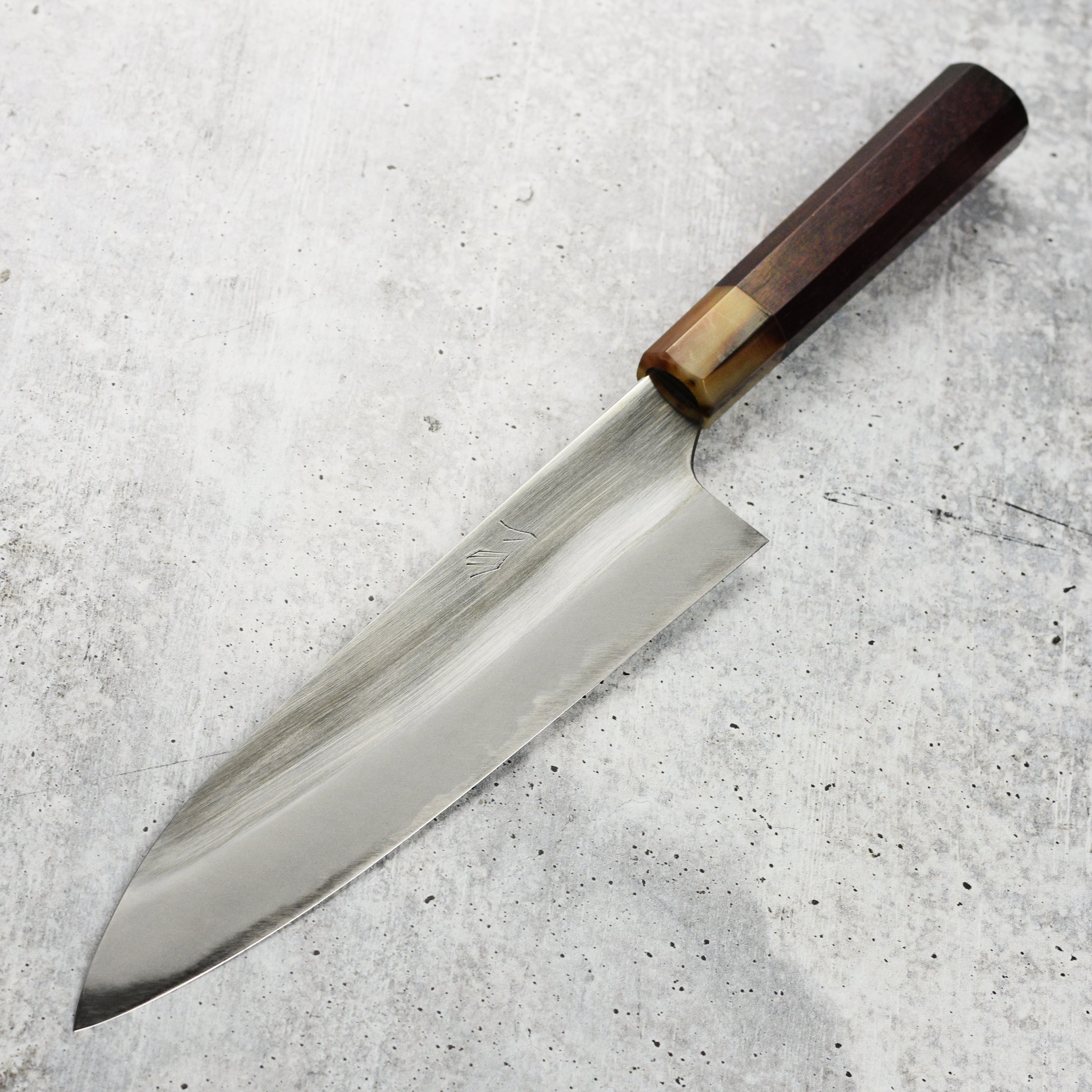 Close-up of the sharp edge of the Mazaki Shirogami Gyuto for detailed craftsmanship