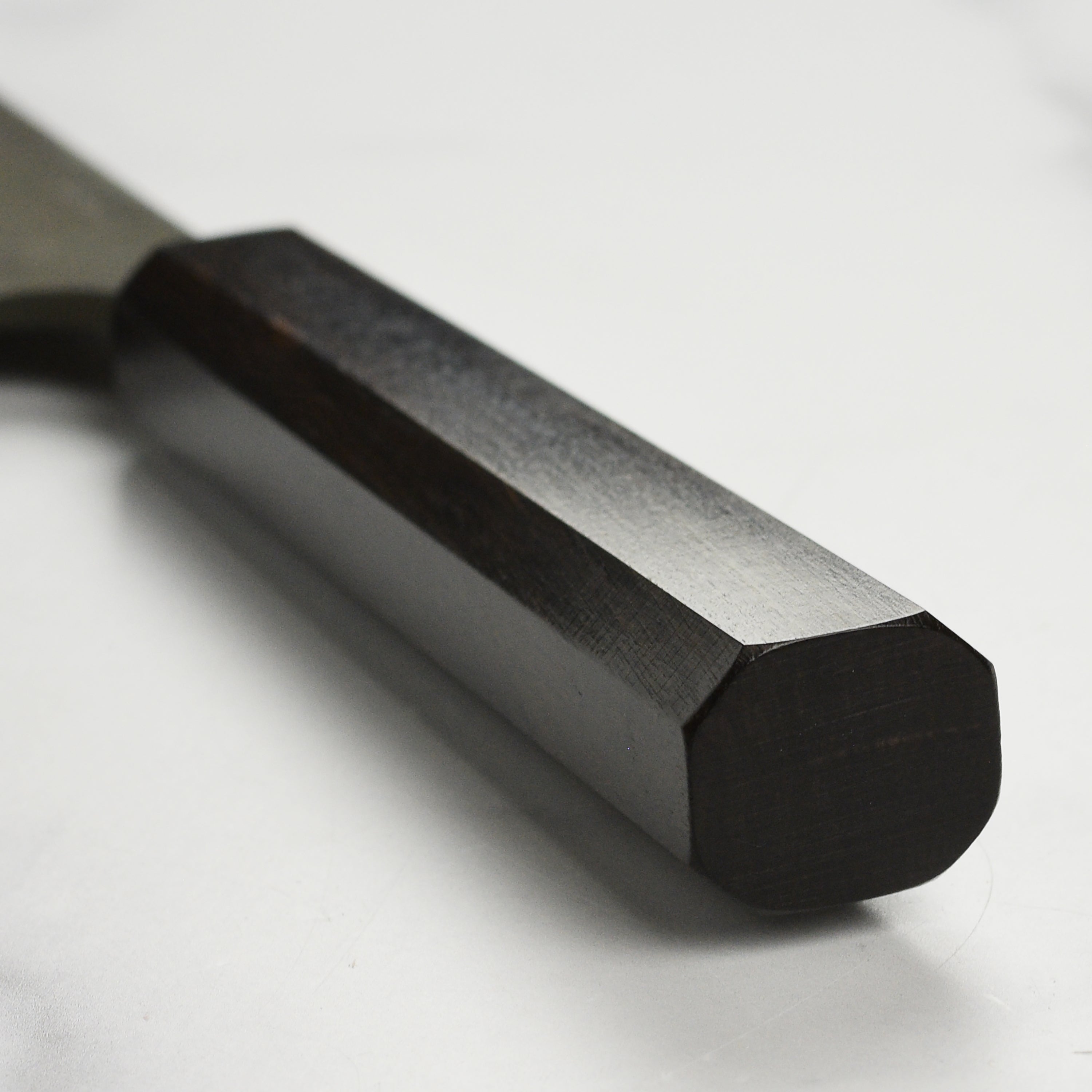 Close-up of the Kurouchi finish on the Japanese knife blade