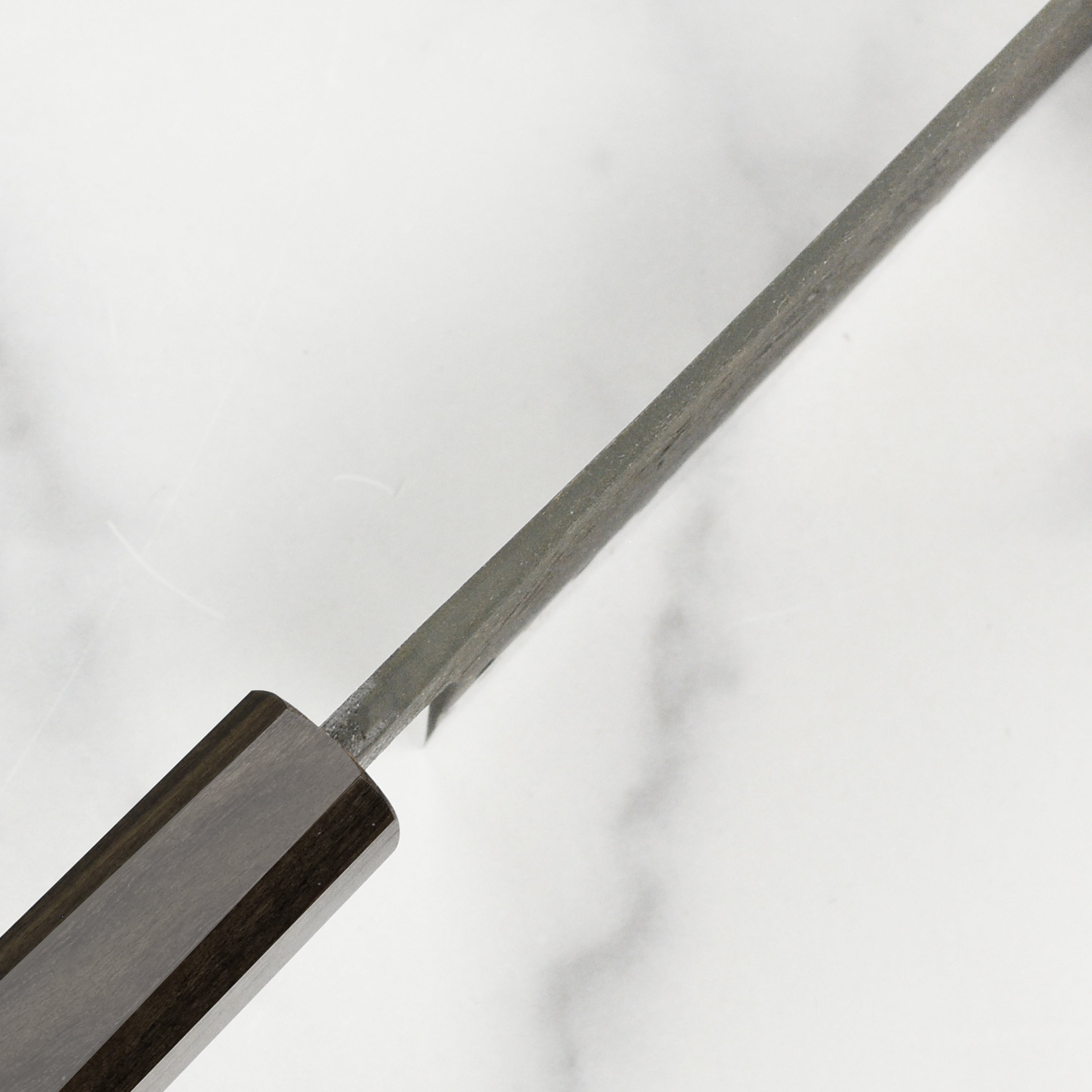 Ergonomic handle of the nakiri knife for comfortable grip