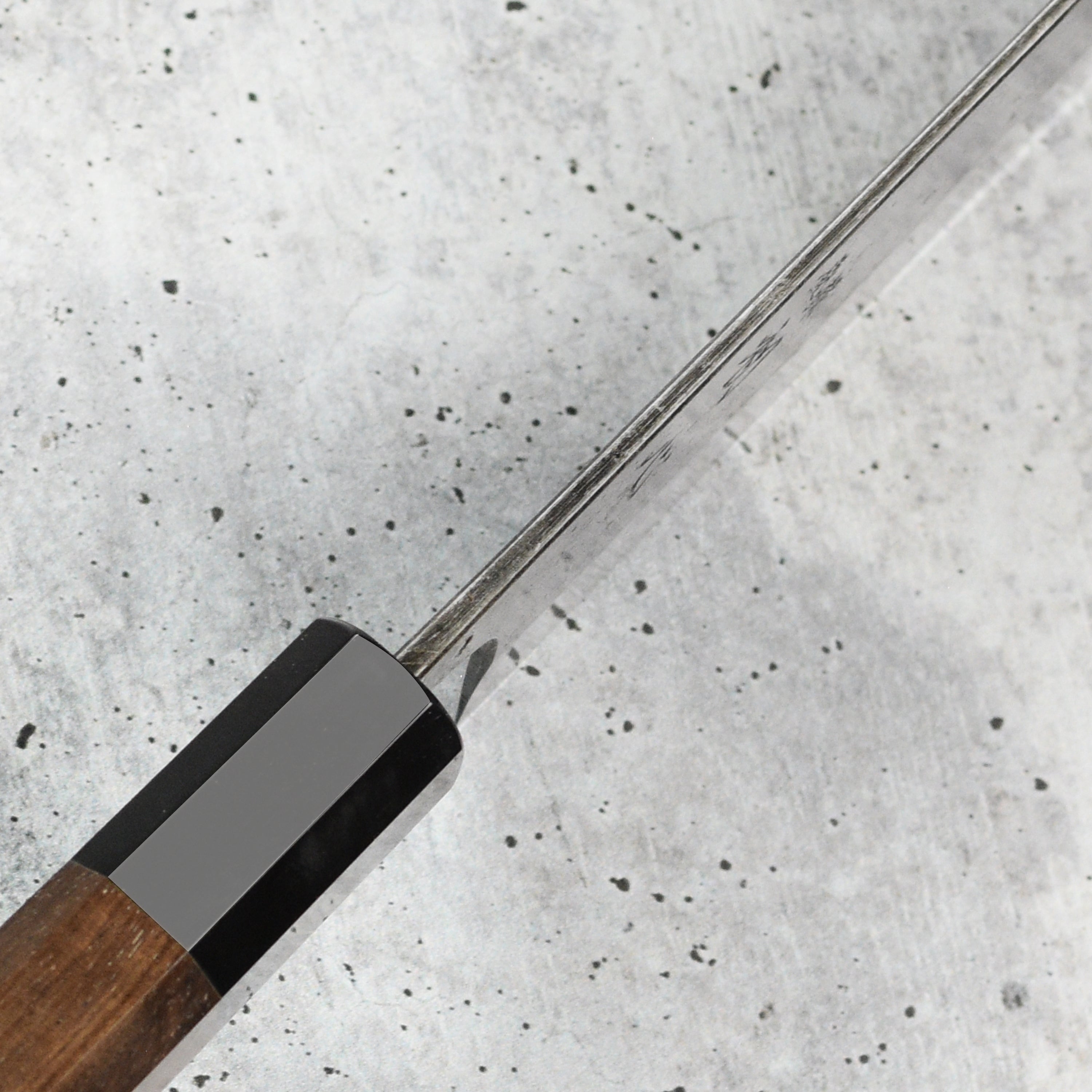 Kitchen scene with Hatsukokoro Nakiri knife slicing vegetables smoothly