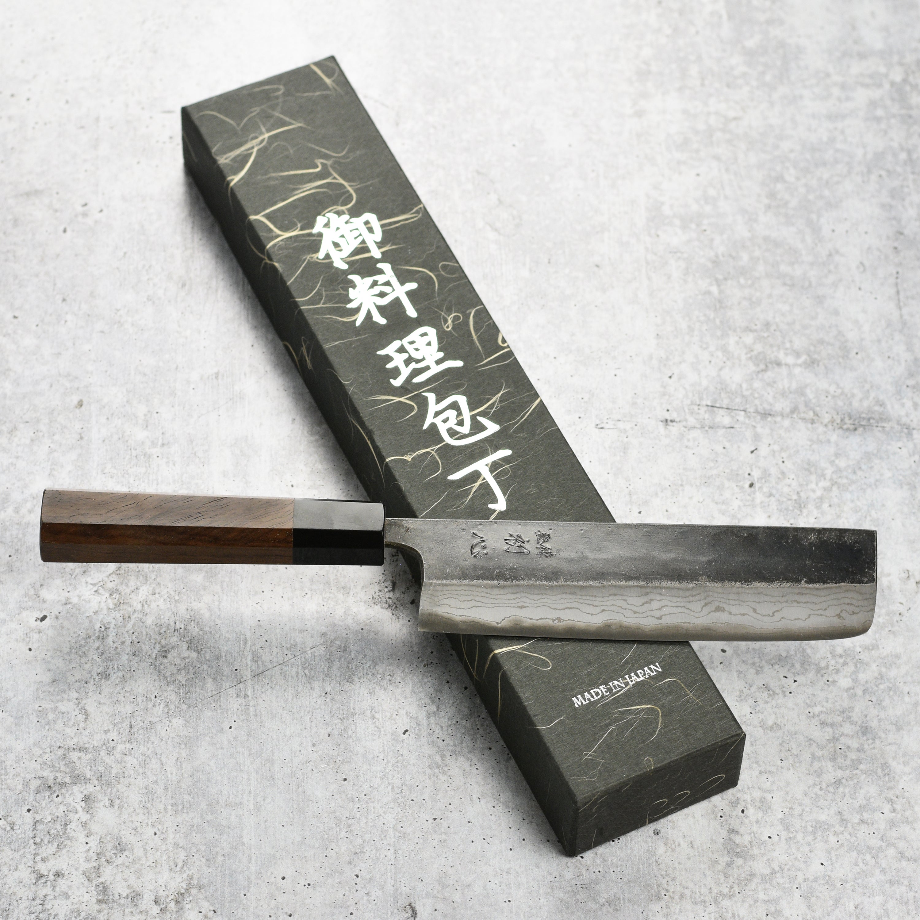 Kitchen scene with Hatsukokoro Nakiri knife slicing vegetables smoothly