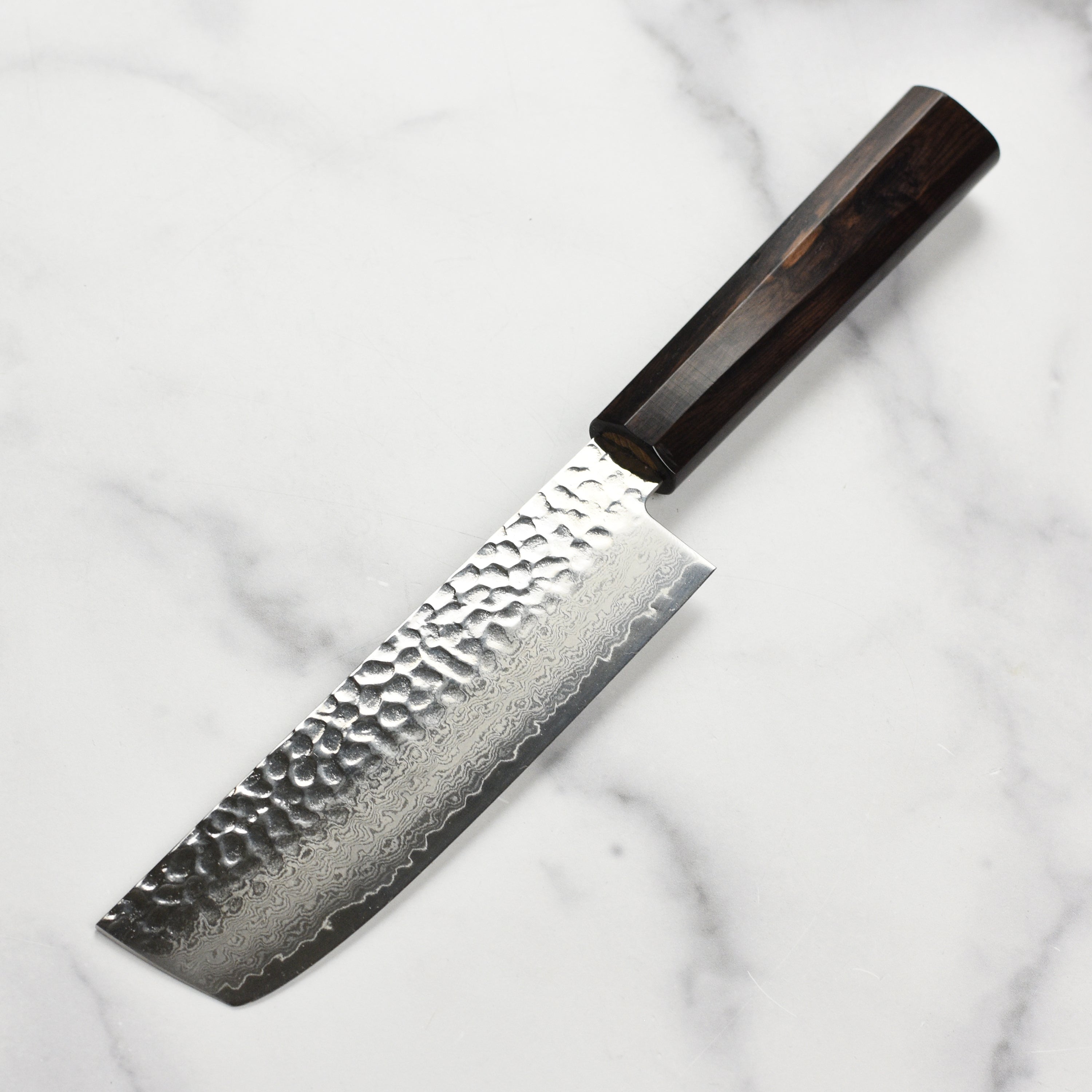 Close-up of the Damascus steel pattern on the Takayuki Nakiri Knife.