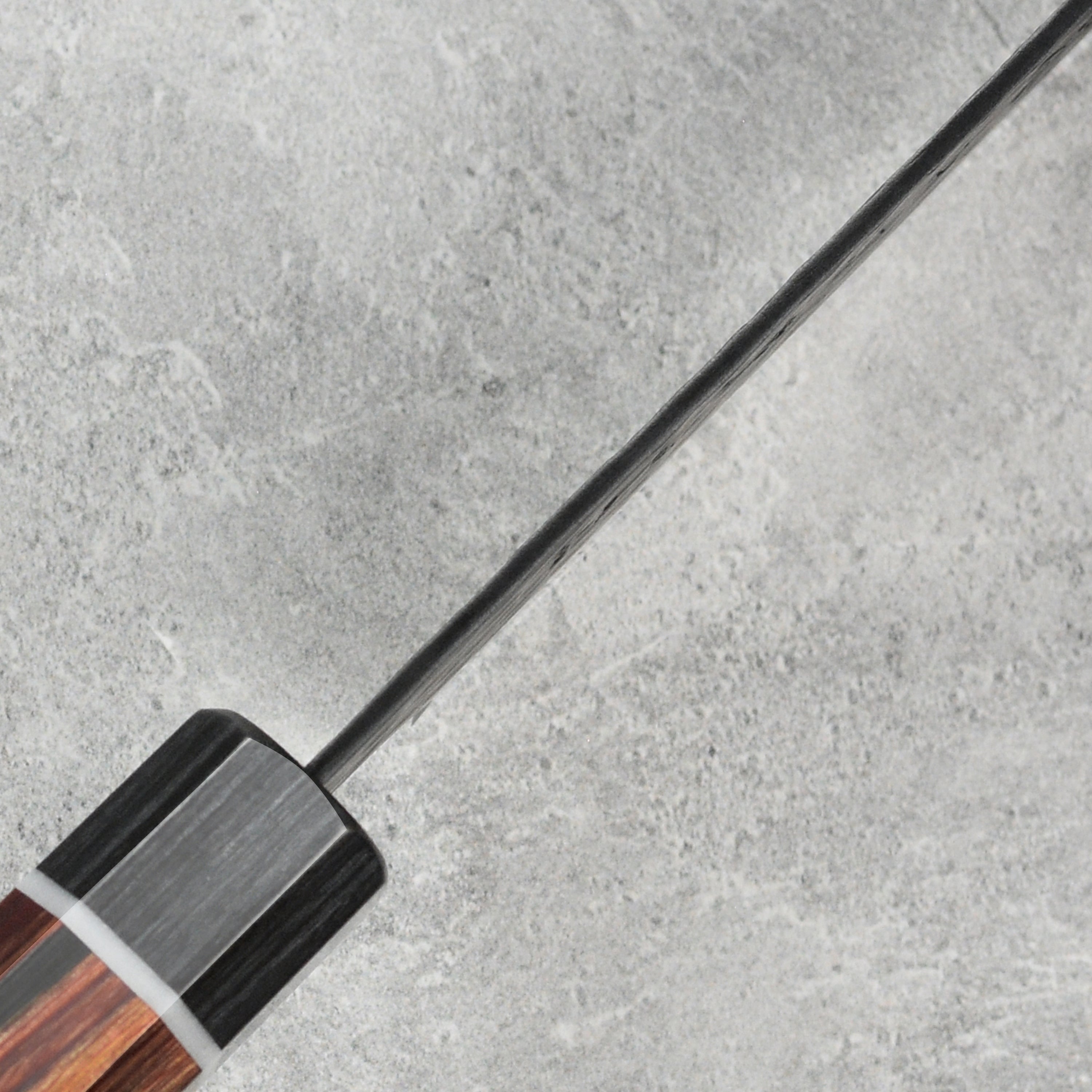 Japanese knife with octagonal pakkawood handle, ideal for nimble chopping and detailed culinary work