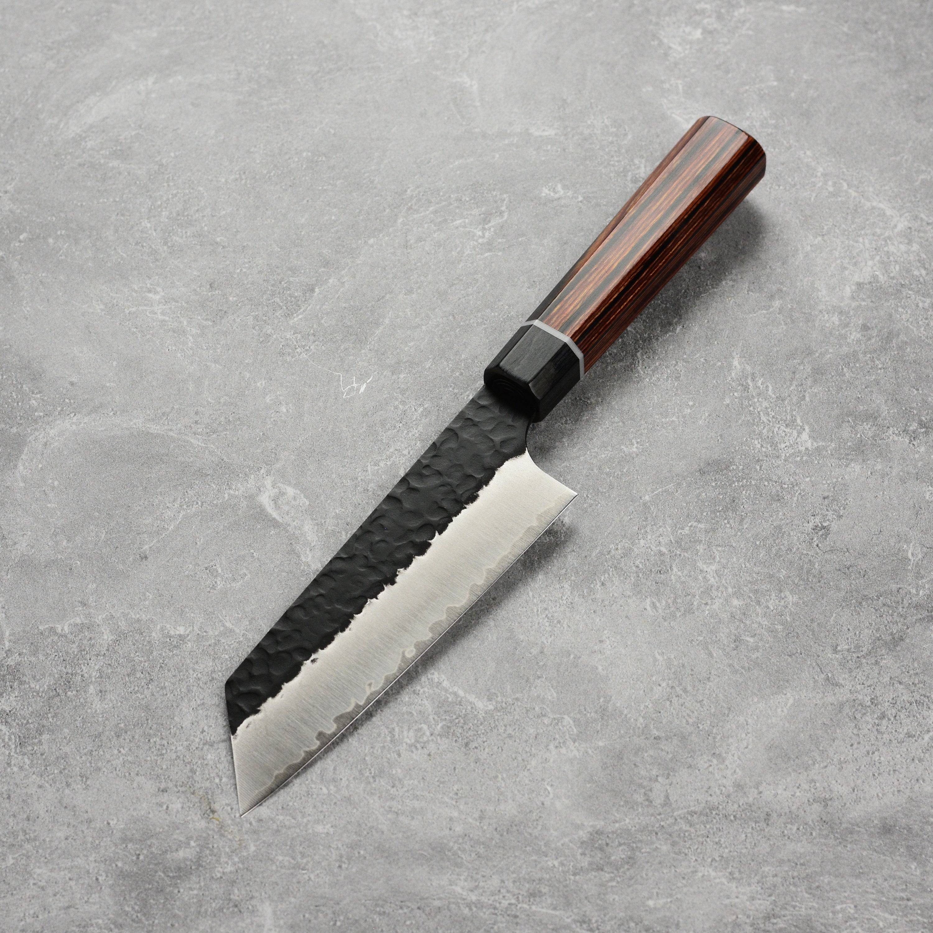 Japanese knife with octagonal pakkawood handle, ideal for nimble chopping and detailed culinary work