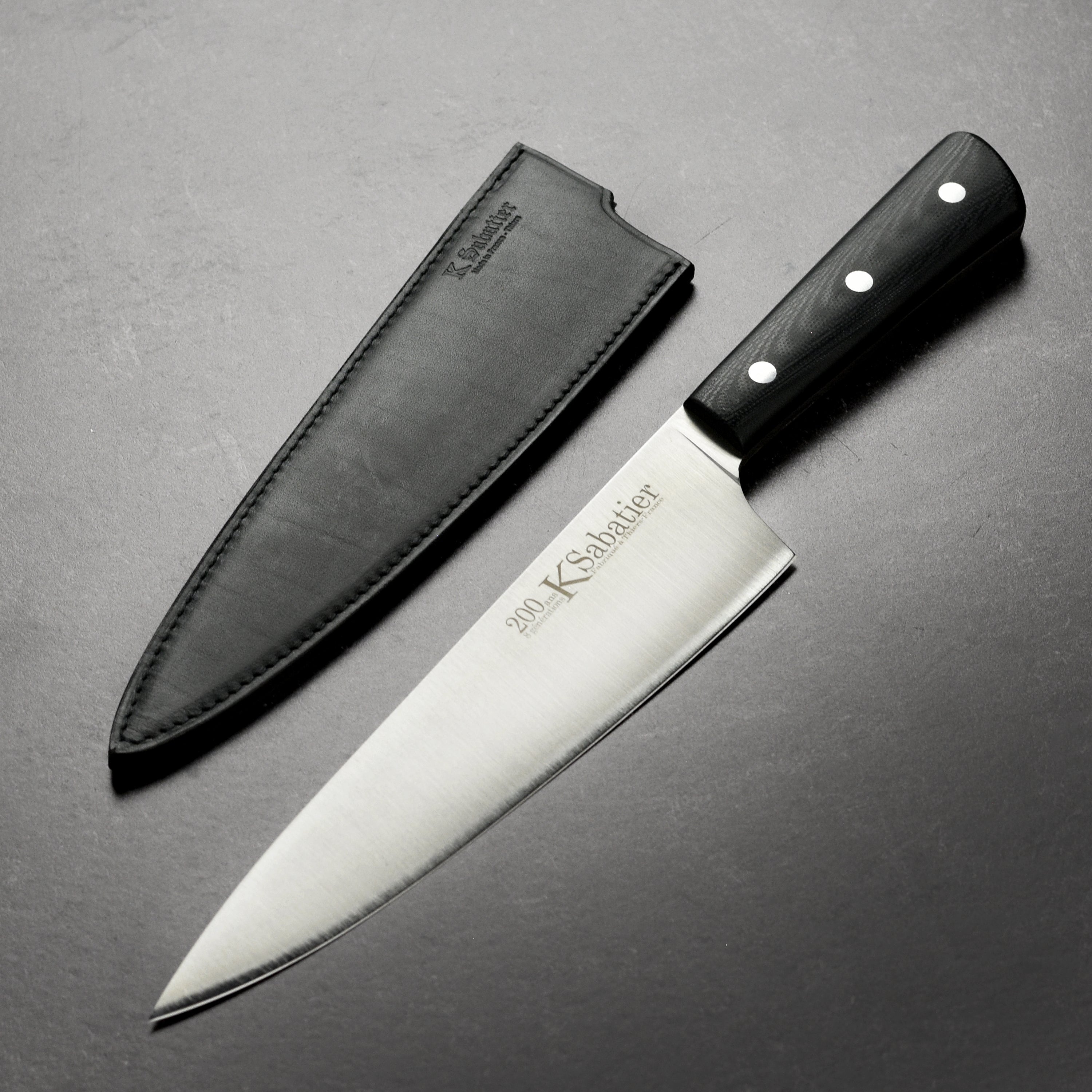 Sabatier 200th Anniversary Chef's Knife with a focus on the blade