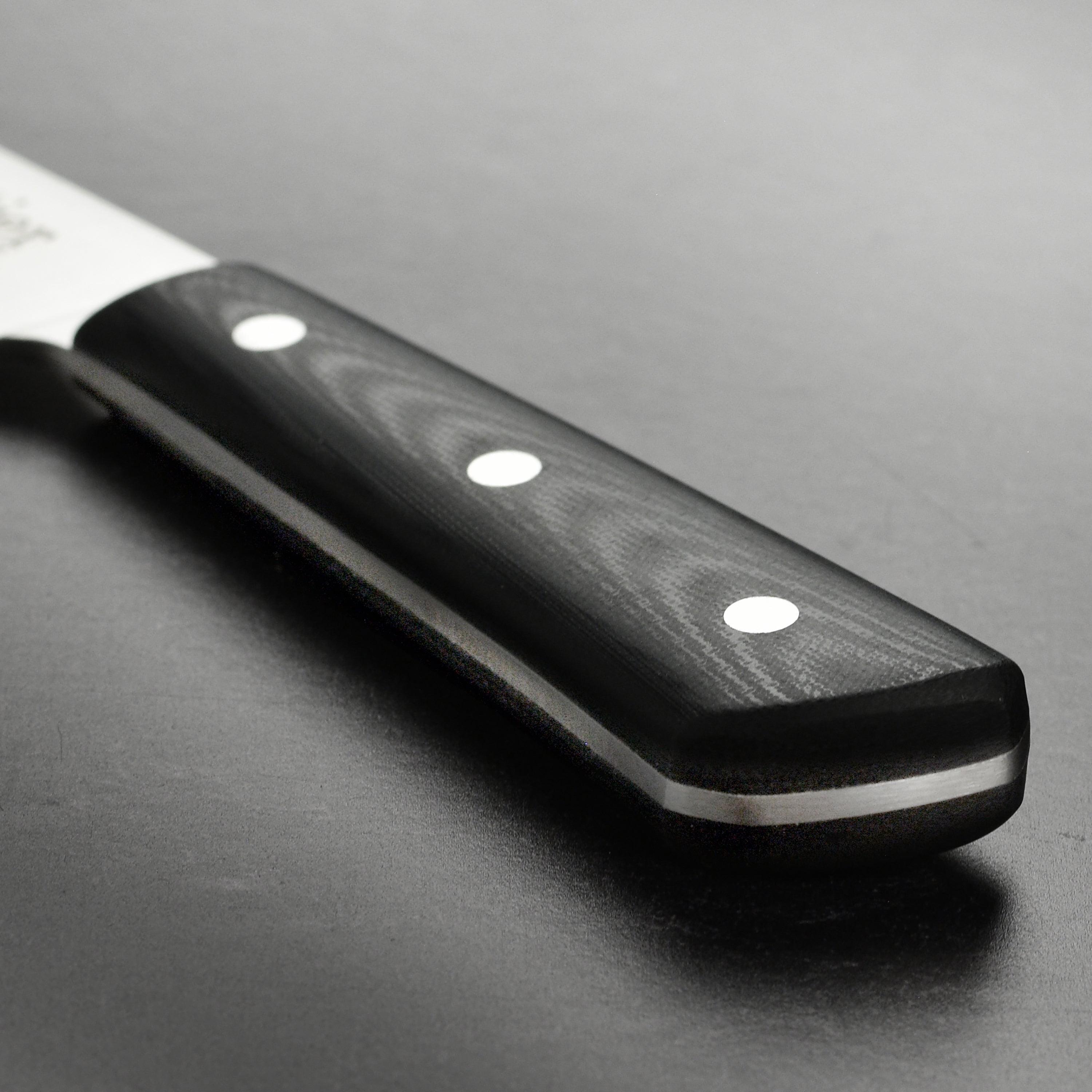 Full view of the Sabatier knife showcasing the G10 fiberglass handle