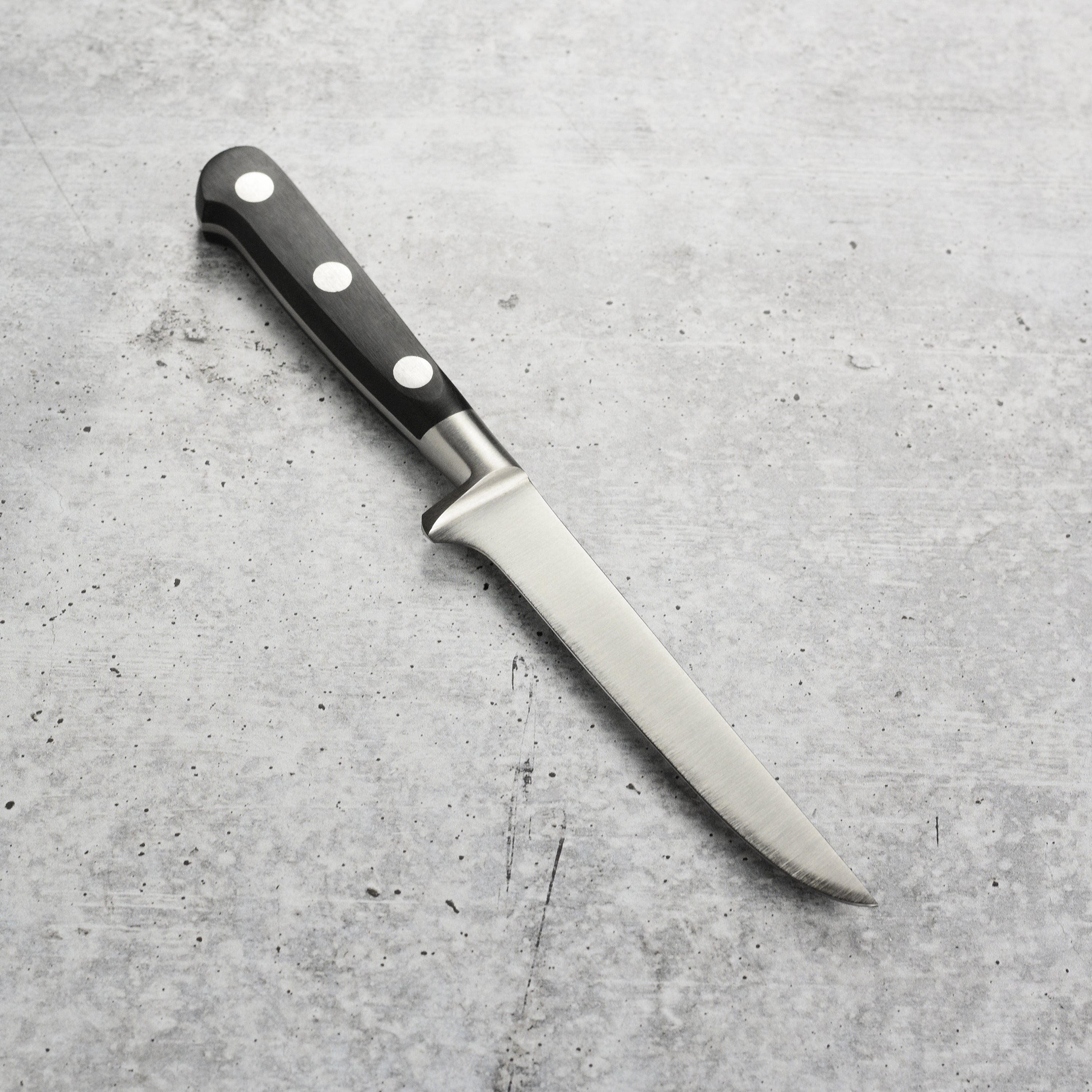K Sabatier boning knife in brown leather sheath, perfect for safe storage and gifting