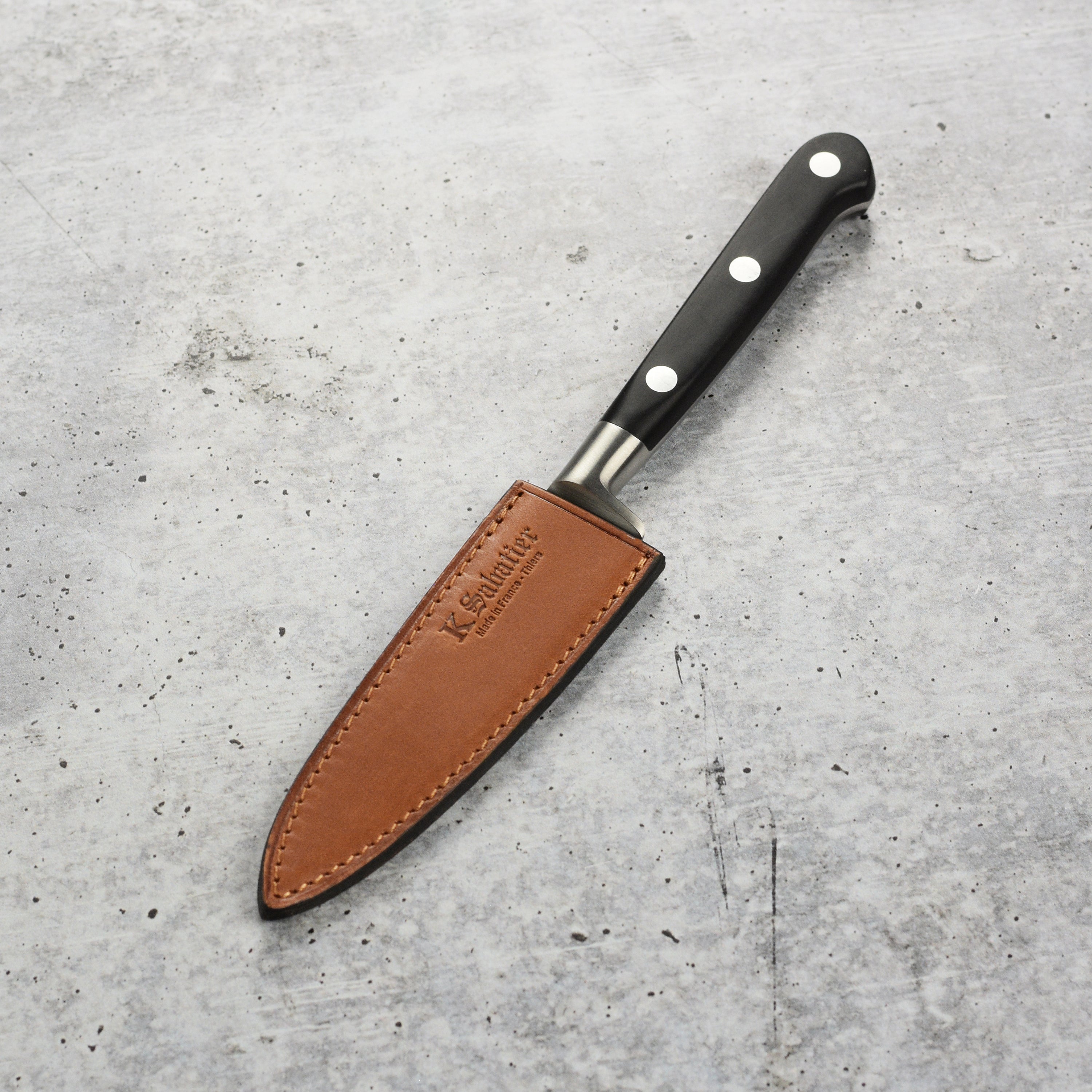 Close-up of K Sabatier 4" paring knife showcasing the Z50C13 stainless steel blade and bolster design.