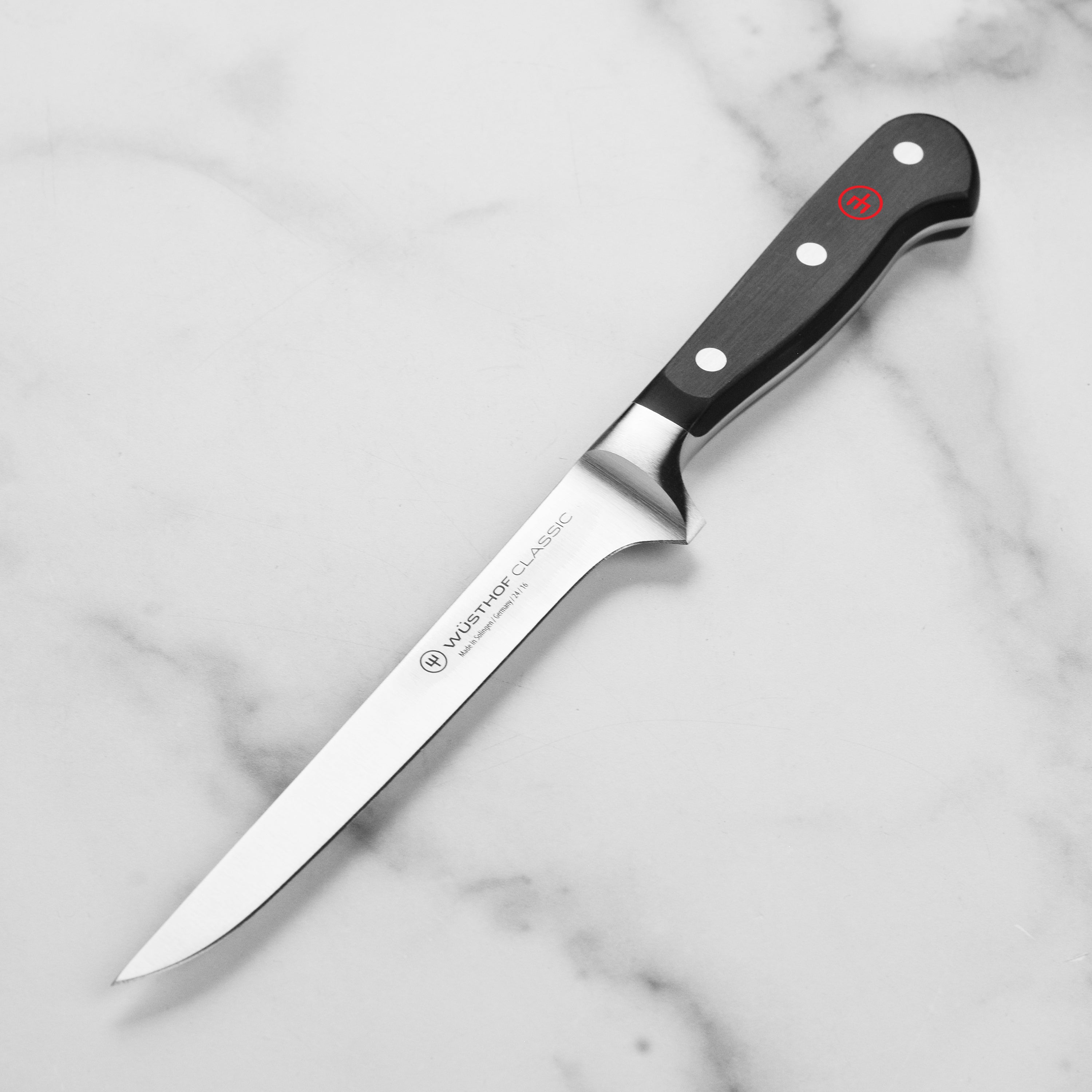 Close-up of the Wusthof Classic 6-Inch Flexible Boning Knife blade and handle.