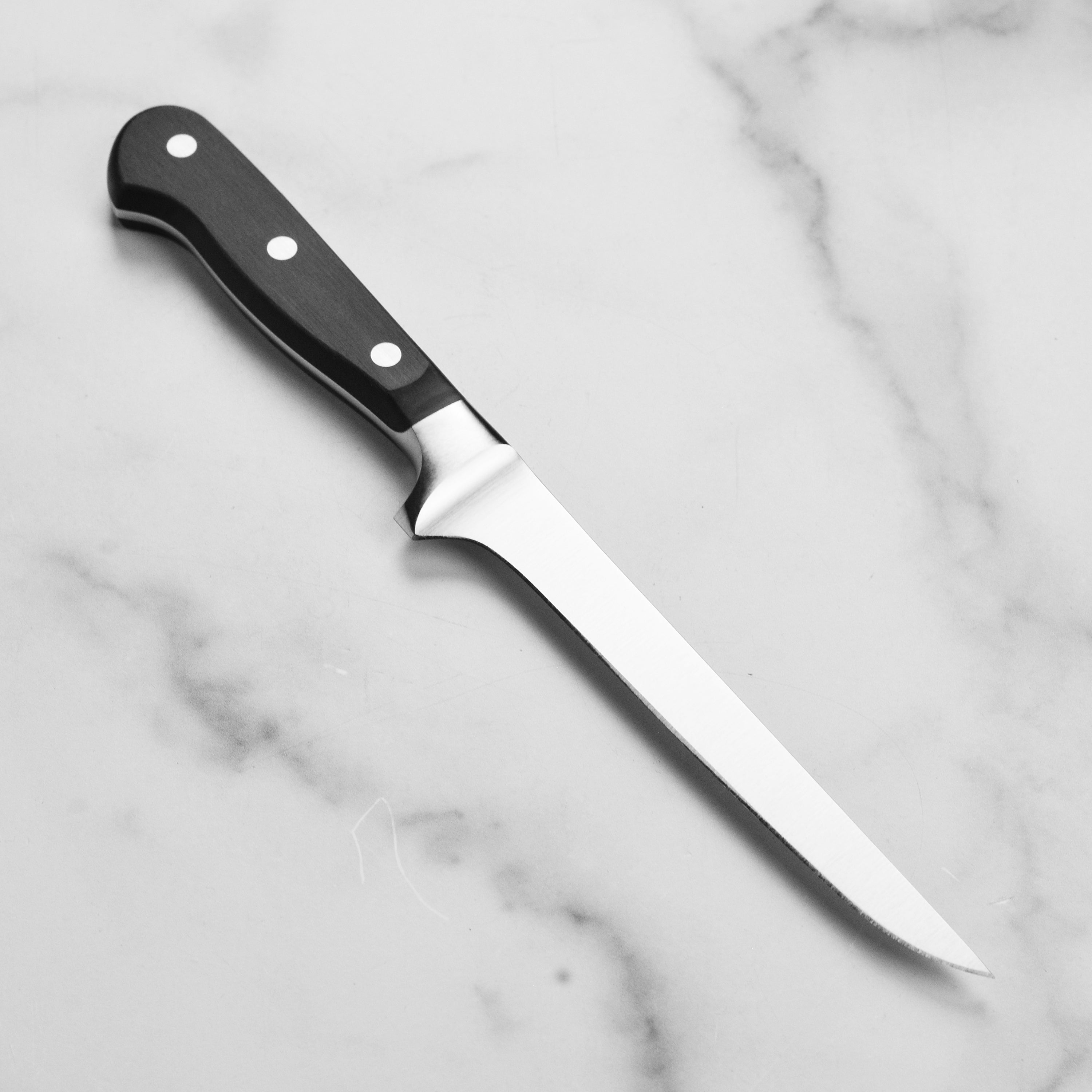 Elegant display of the Wusthof Classic boning knife highlighting the craftsmanship.