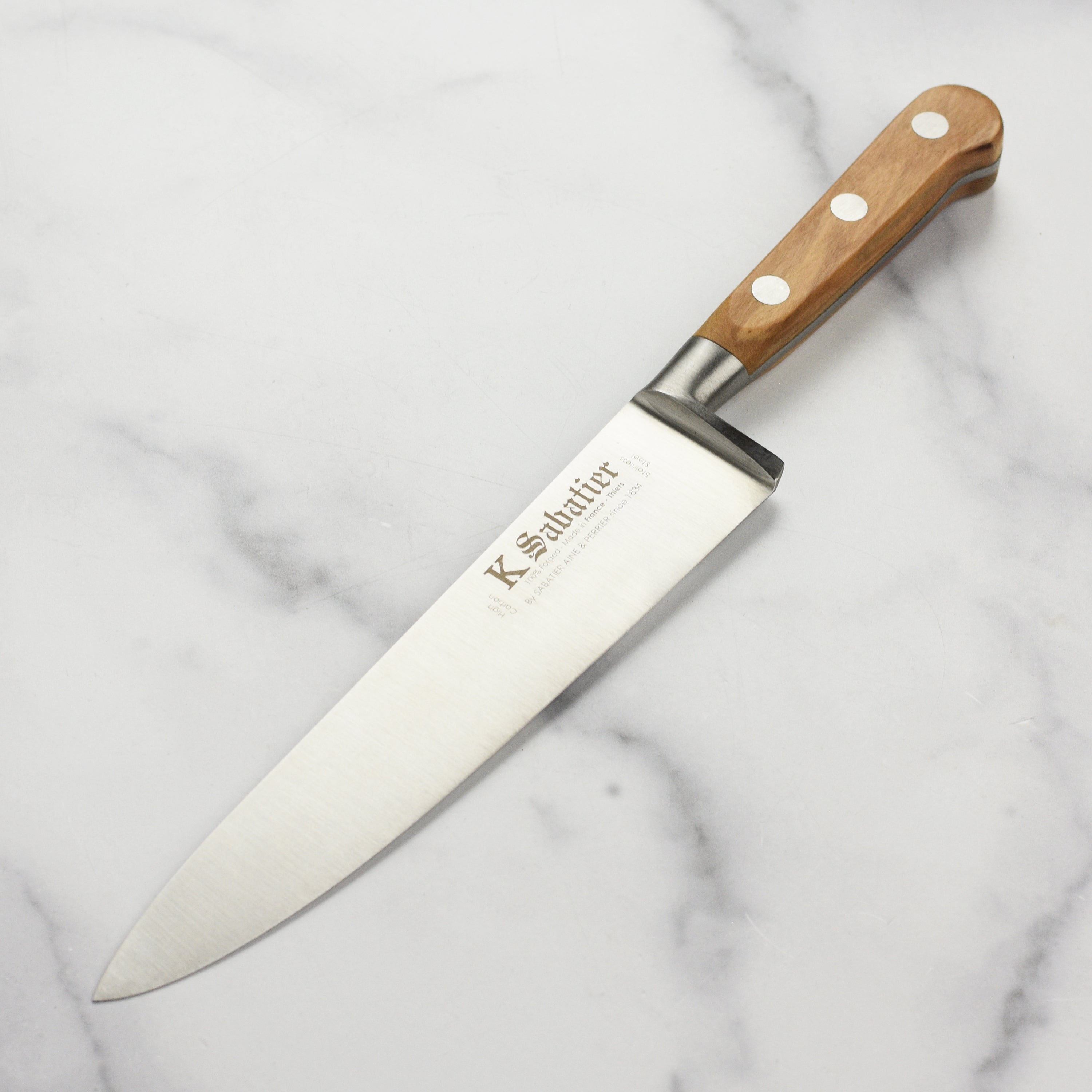 K Sabatier Olive Wood Chef's Knife from above showing the blade and handle