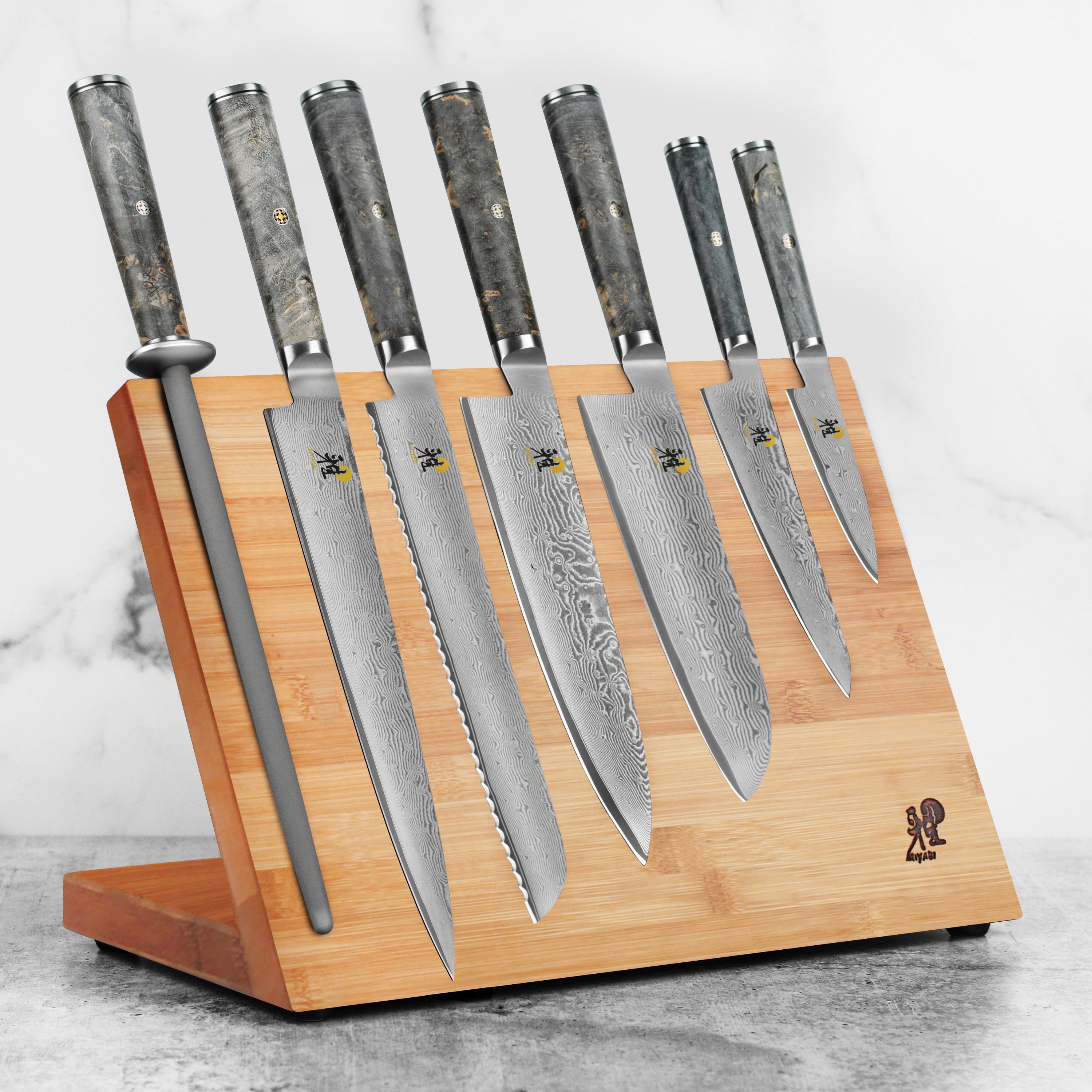 Miyabi Black 8-piece knife set on a kitchen counter, highlighting the magnetic knife holder.