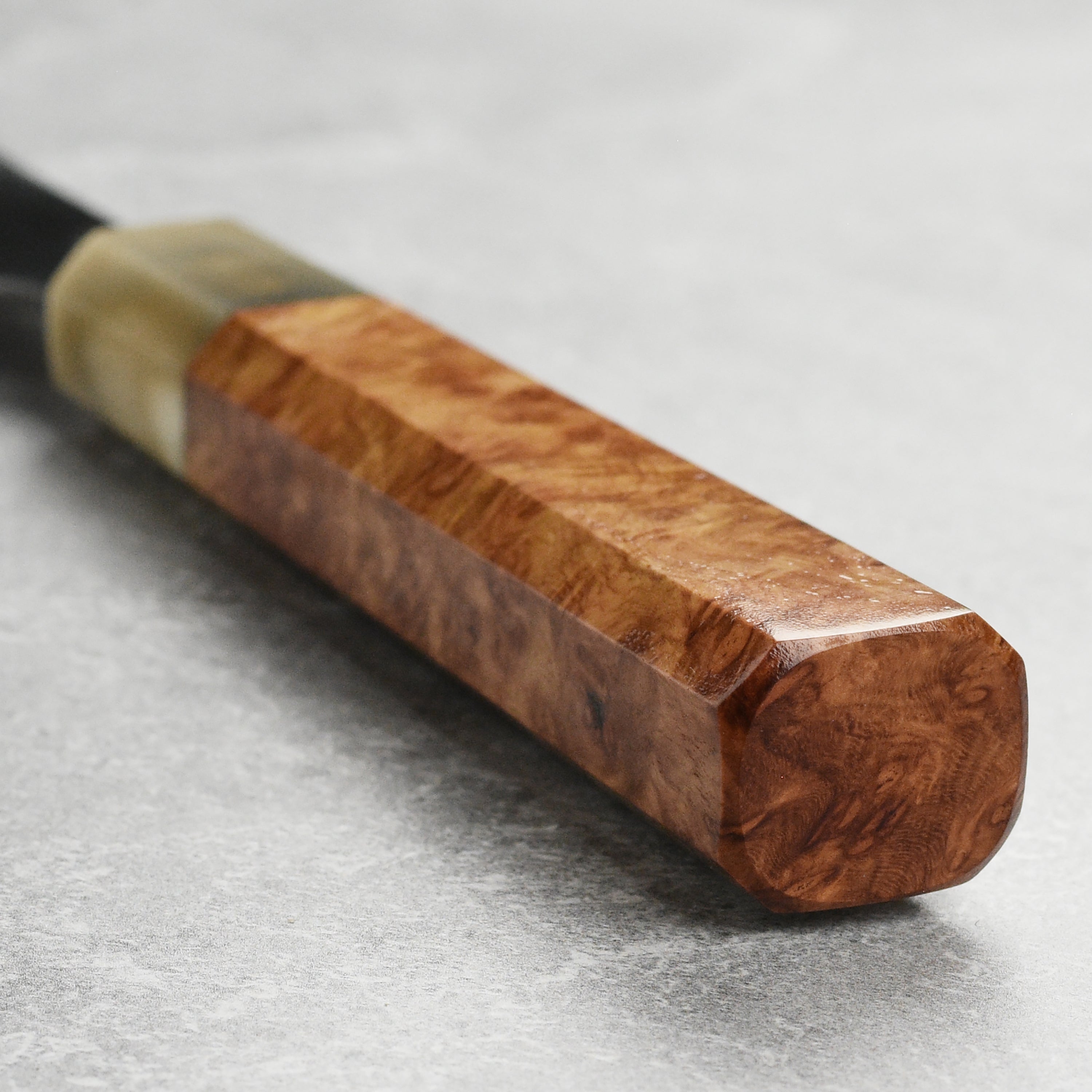Top view of the Keskin carbon steel gyuto, perfect for slicing vegetables with precision
