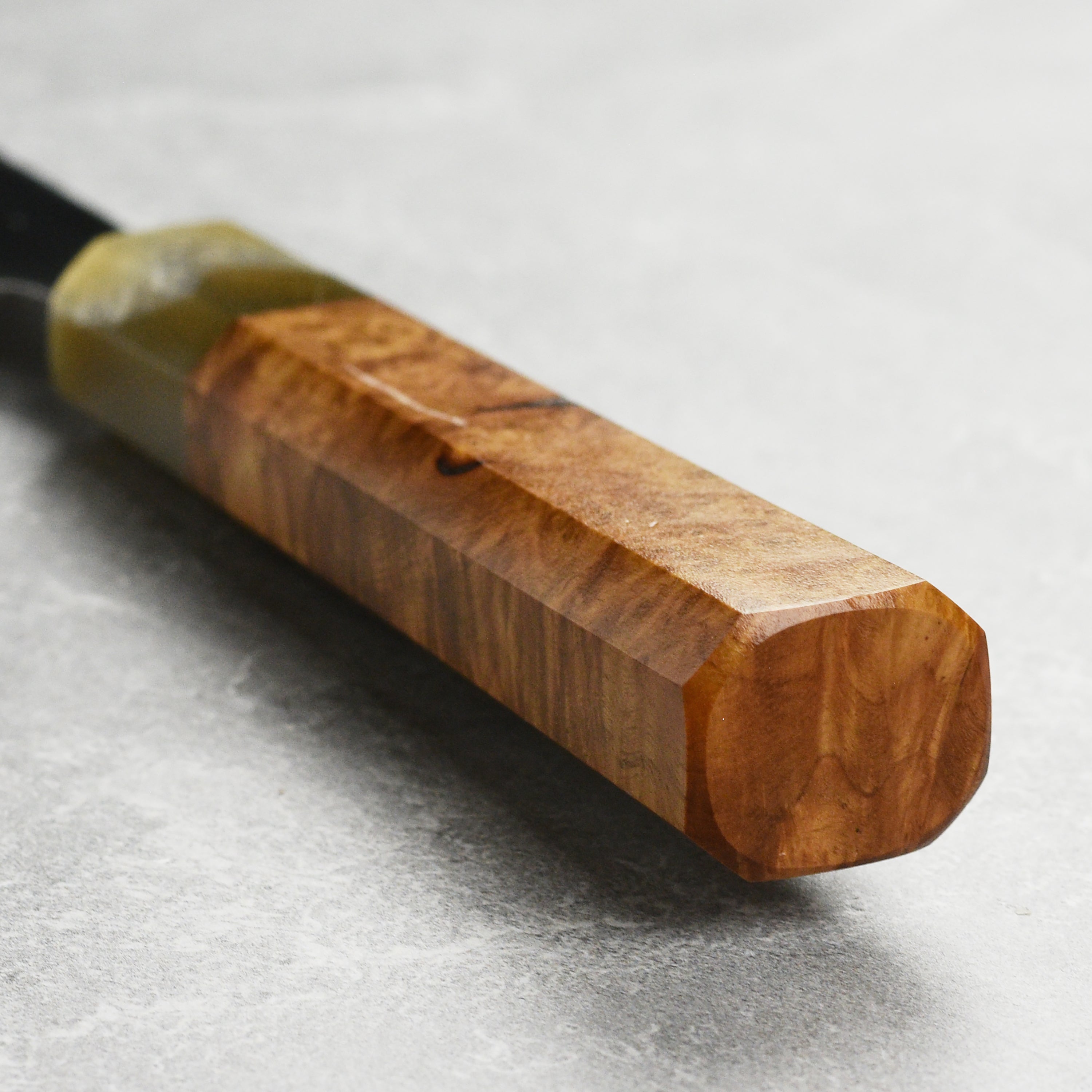 Precision cutting with the top-rated carbon steel kitchen knife, ideal for various culinary tasks.