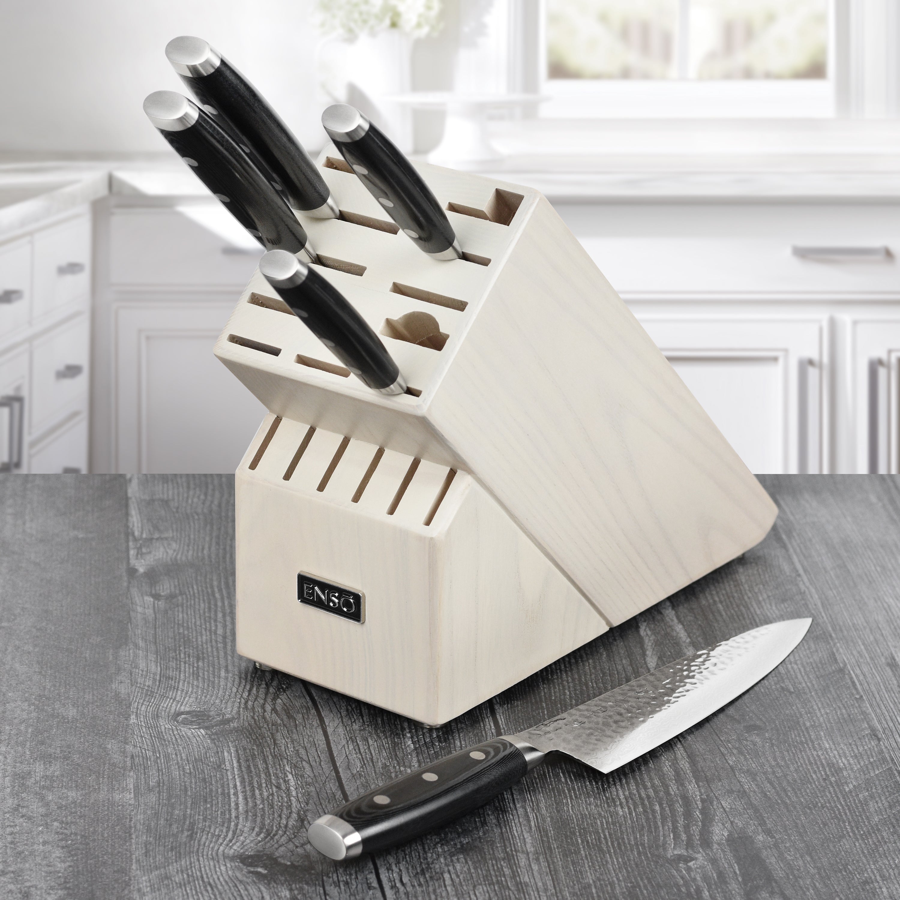 Full view of the knife block displaying the beautiful black canvas micarta and stainless steel accents.