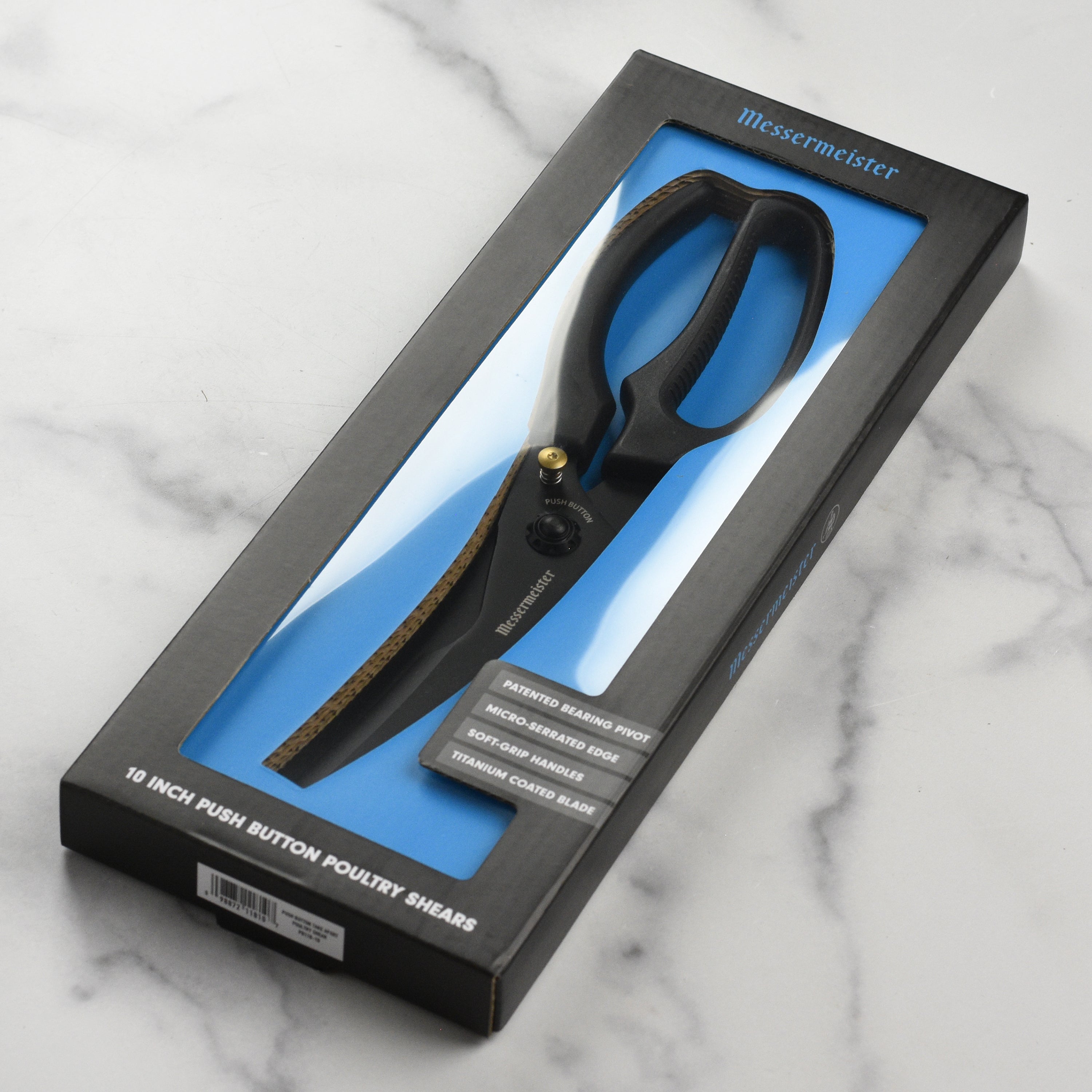 Titanium Pro Poultry Shears showcasing the ergonomic handle and titanium-coated blades.