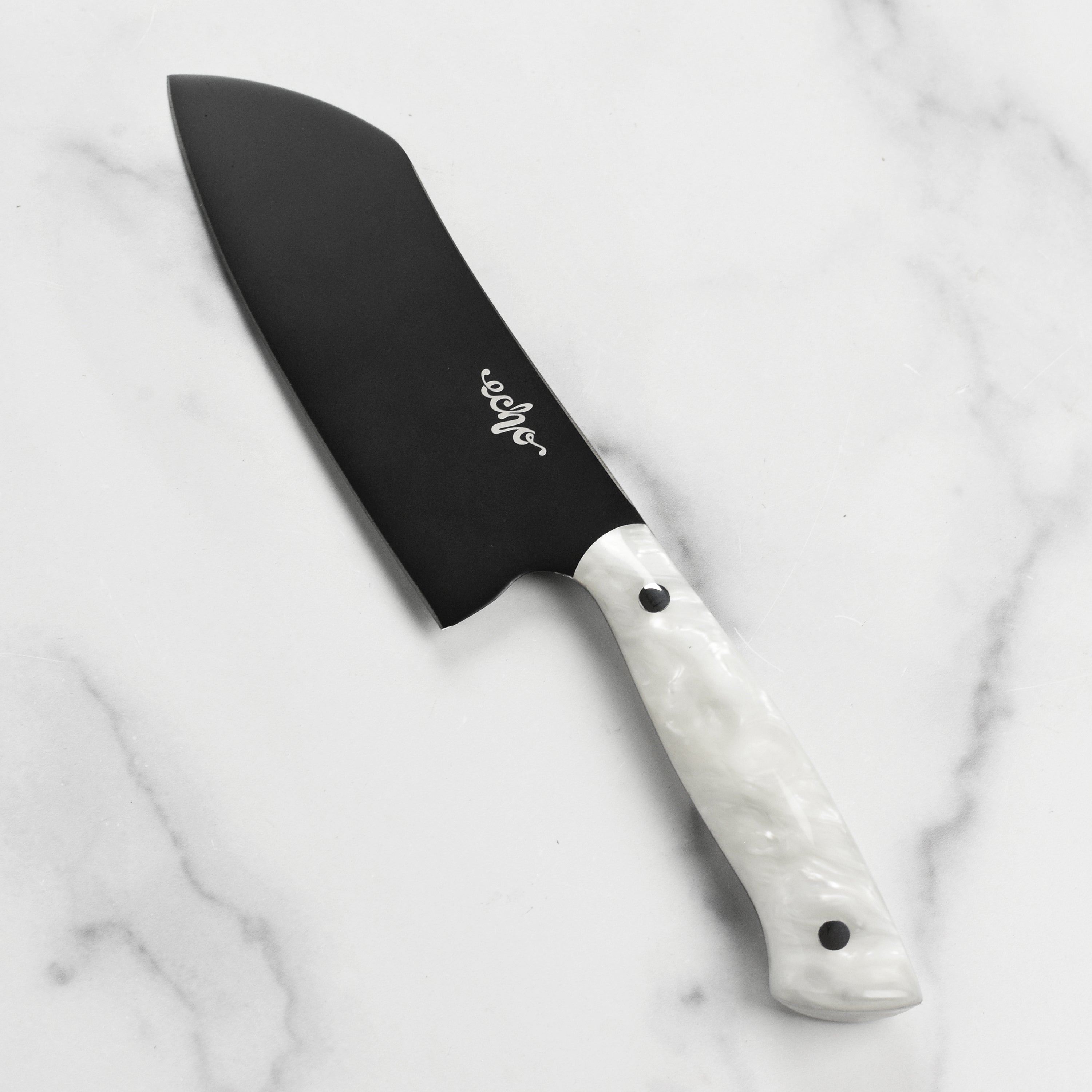 The Quintin Middleton Elite 6" Santoku Knife displayed in a kitchen setting, ideal for chopping vegetables and meats.
