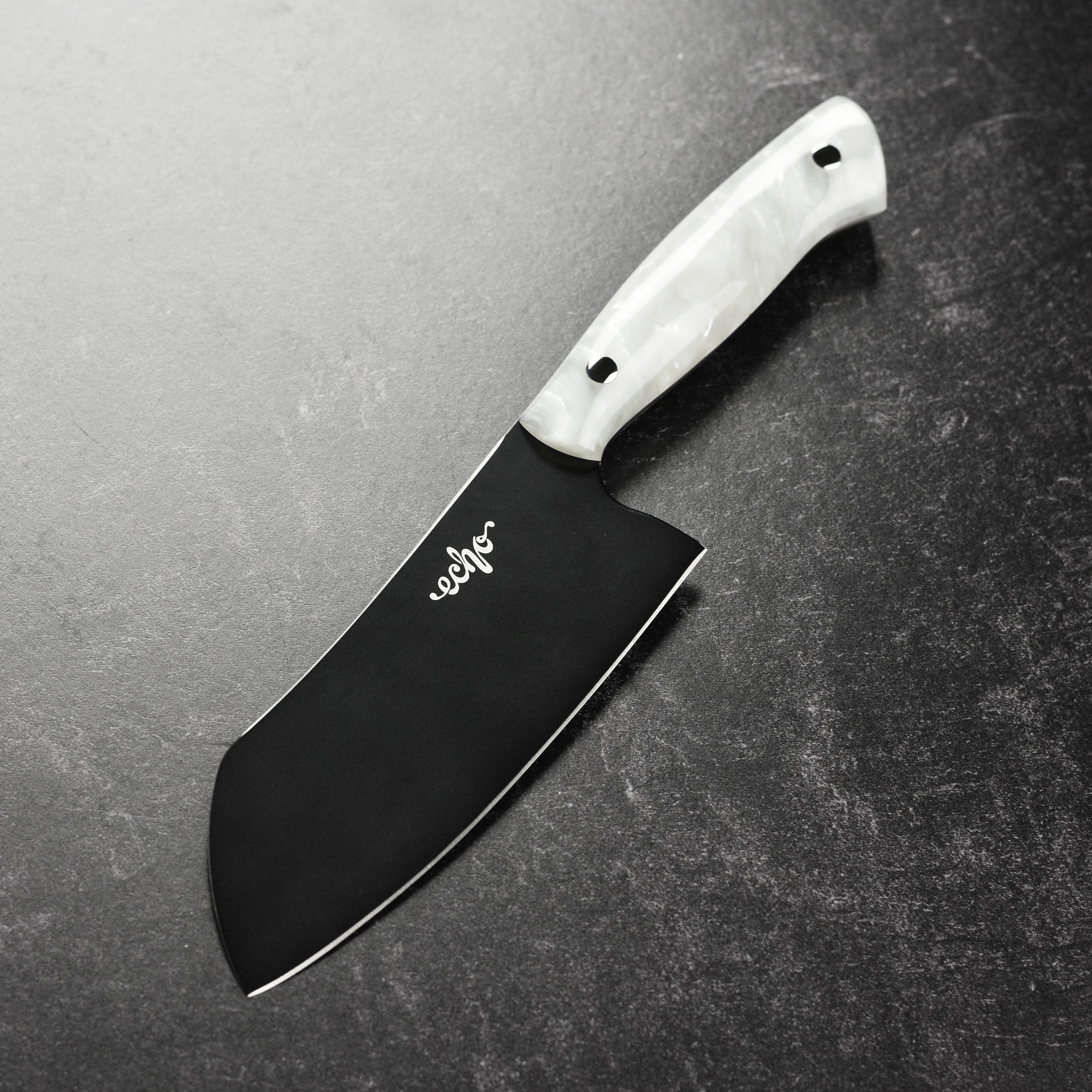 Close-up of the Quintin Middleton Elite 6" Santoku Knife blade highlighting the AEB-L stainless steel and ceramic finish.