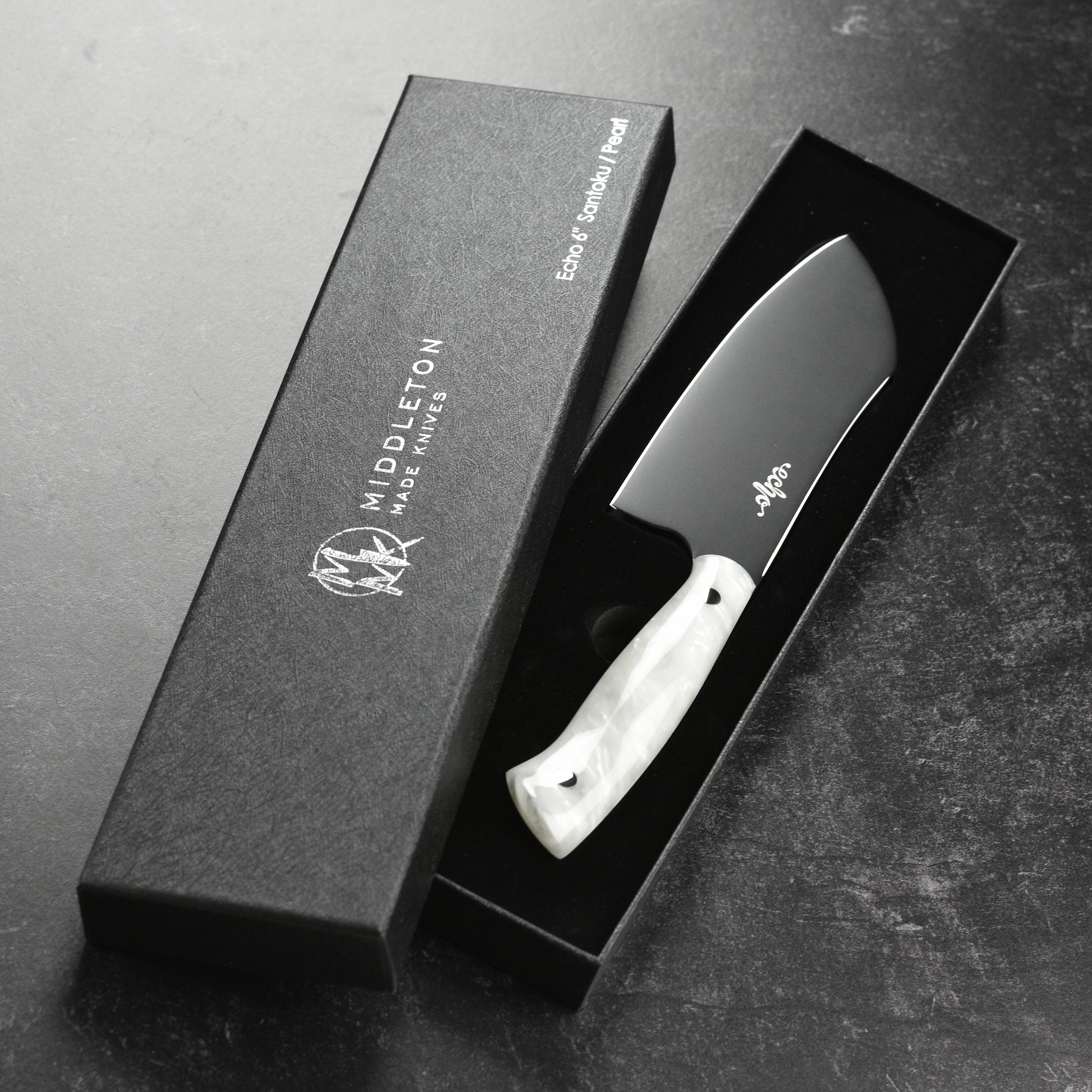 Ergonomic handle of the Quintin Middleton Elite 6" Santoku Knife, designed for comfort and control.