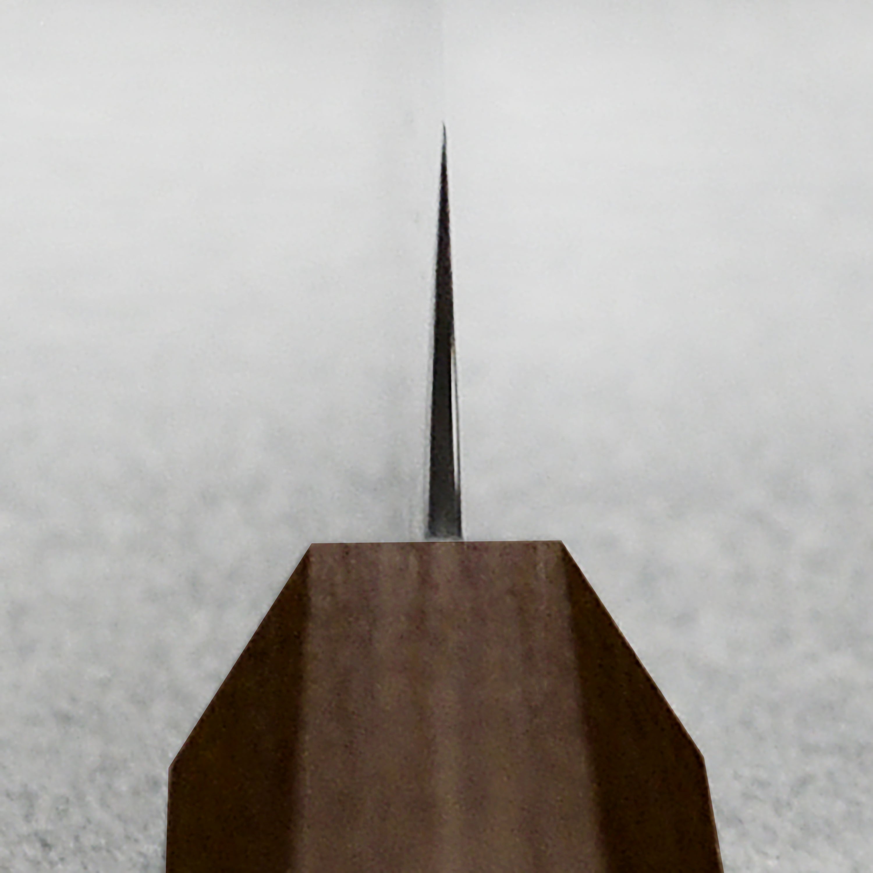 Yaxell Hana petty knife displayed with fresh vegetables, demonstrating precision cutting capabilities.