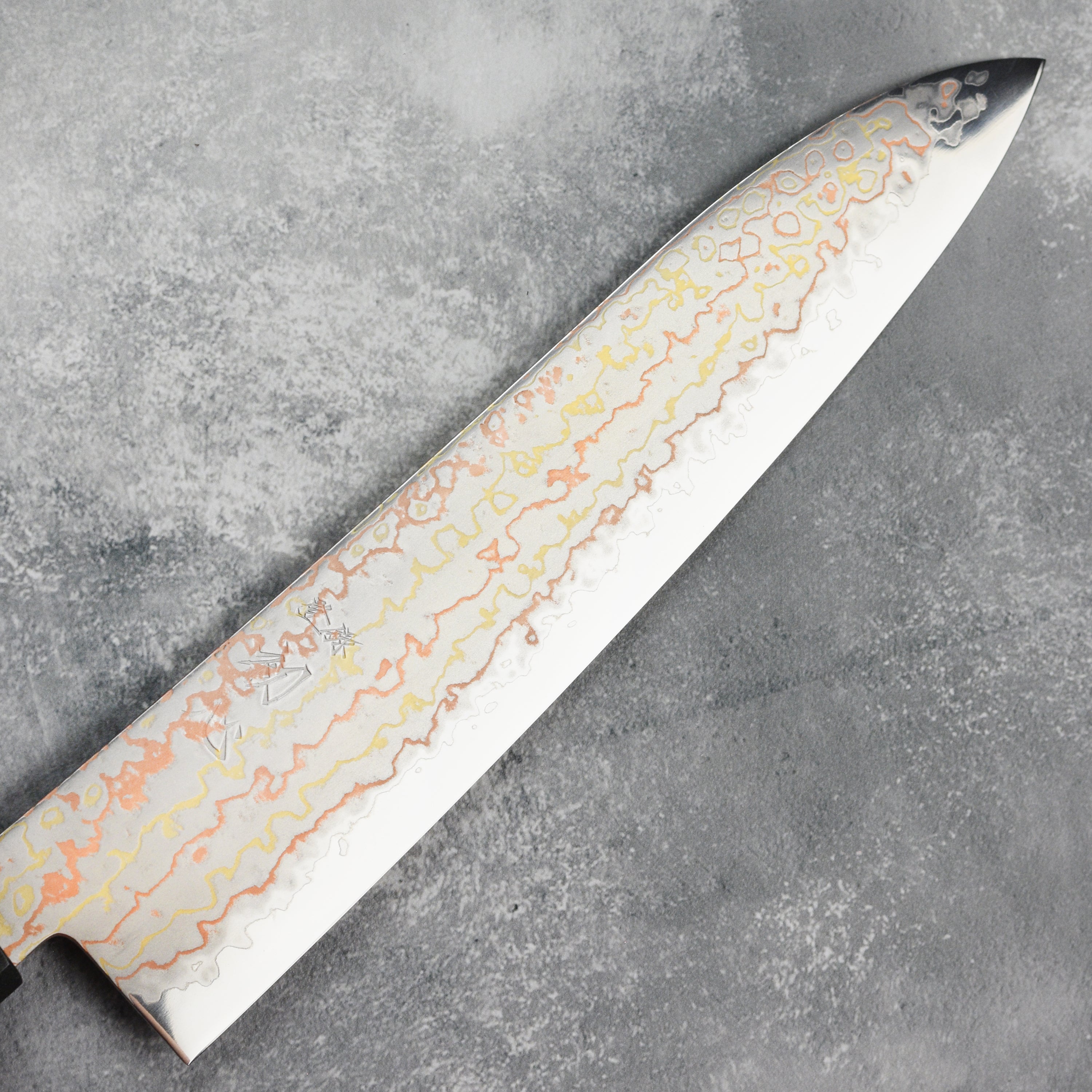 Chef using the Japanese gyuto knife for slicing vegetables