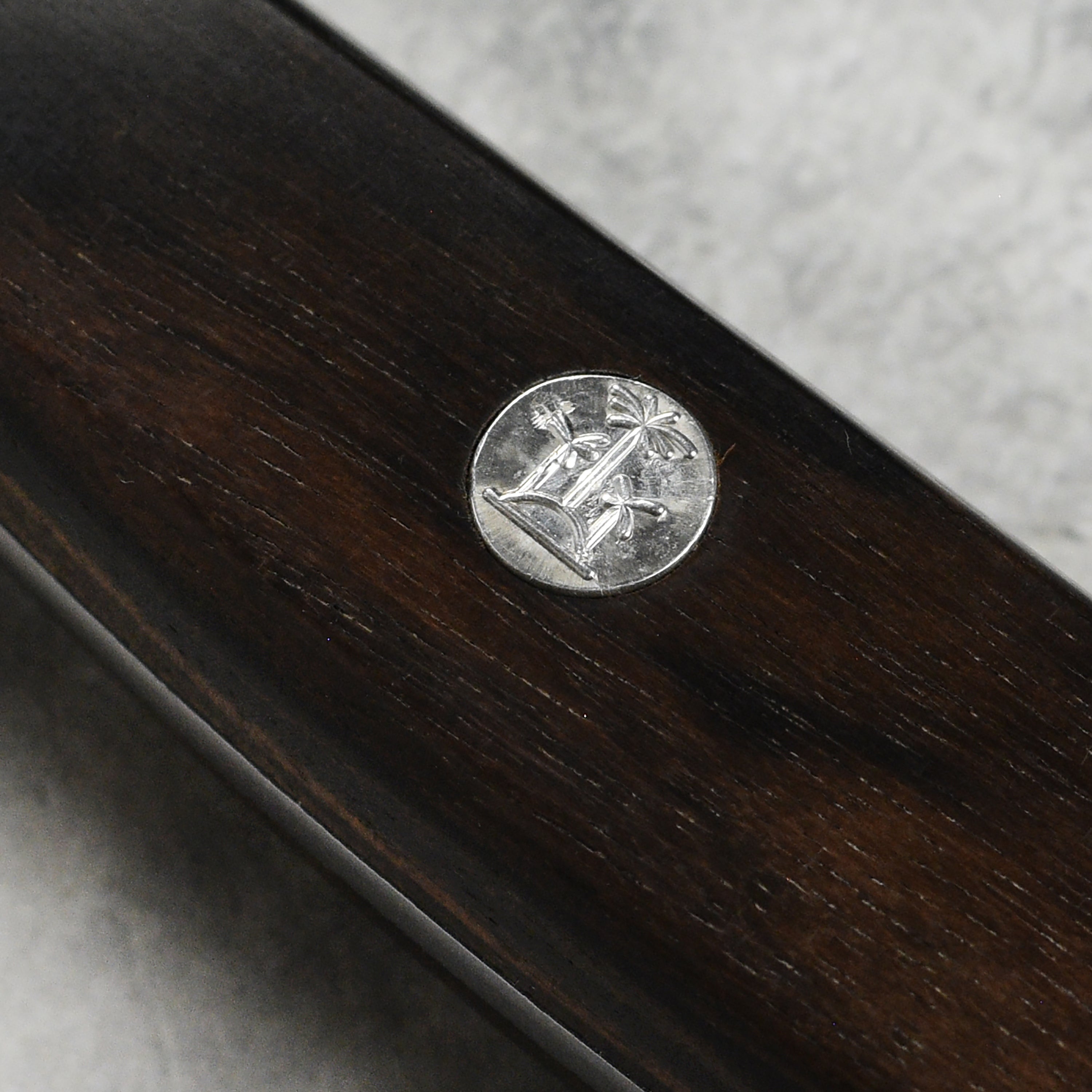 Close-up of the handle and bolster of the professional chefs knife
