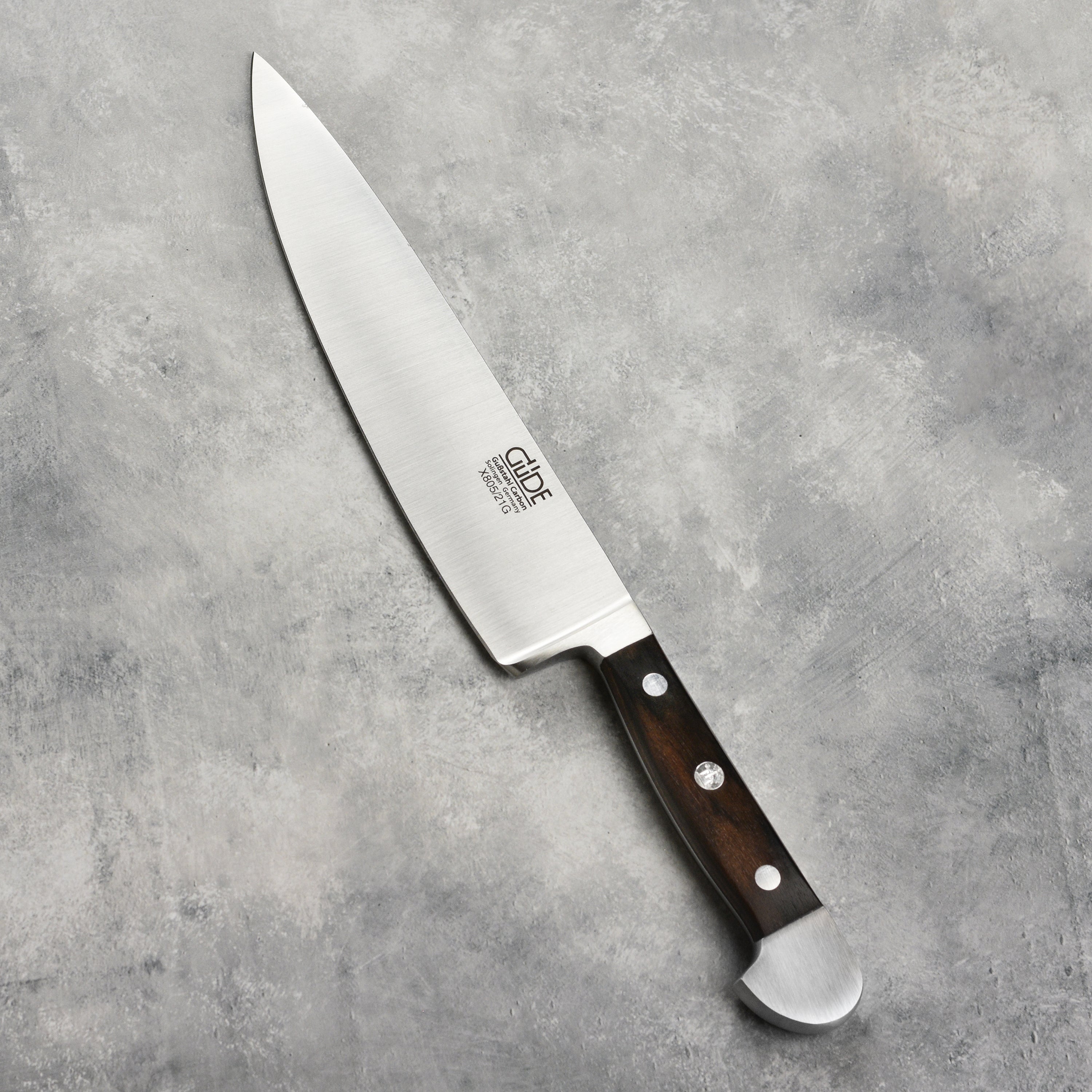 Top view of the 8.25-inch German carbon steel chefs knife in use