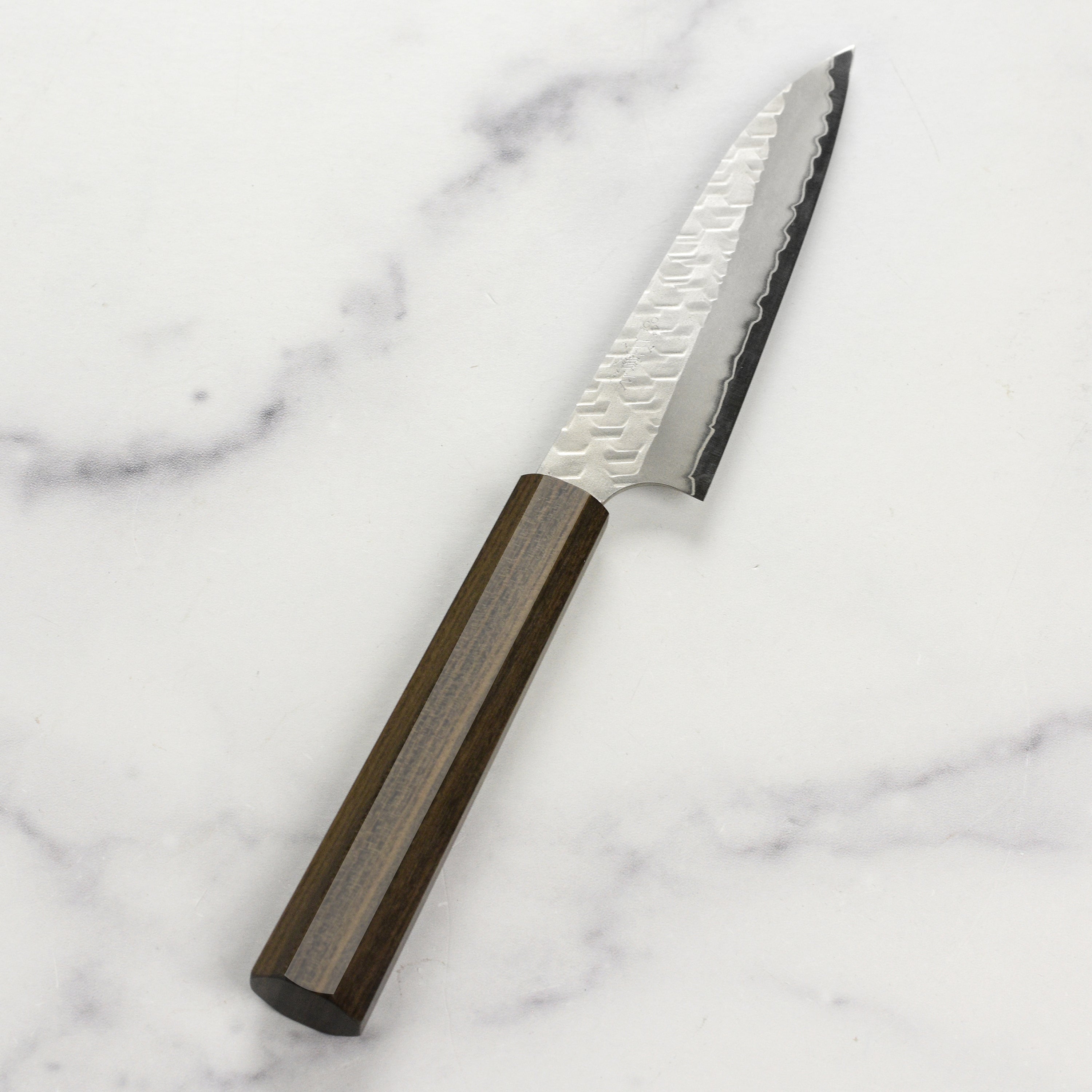 Nigara SG2 petty knife with hammered finish for detailed slicing