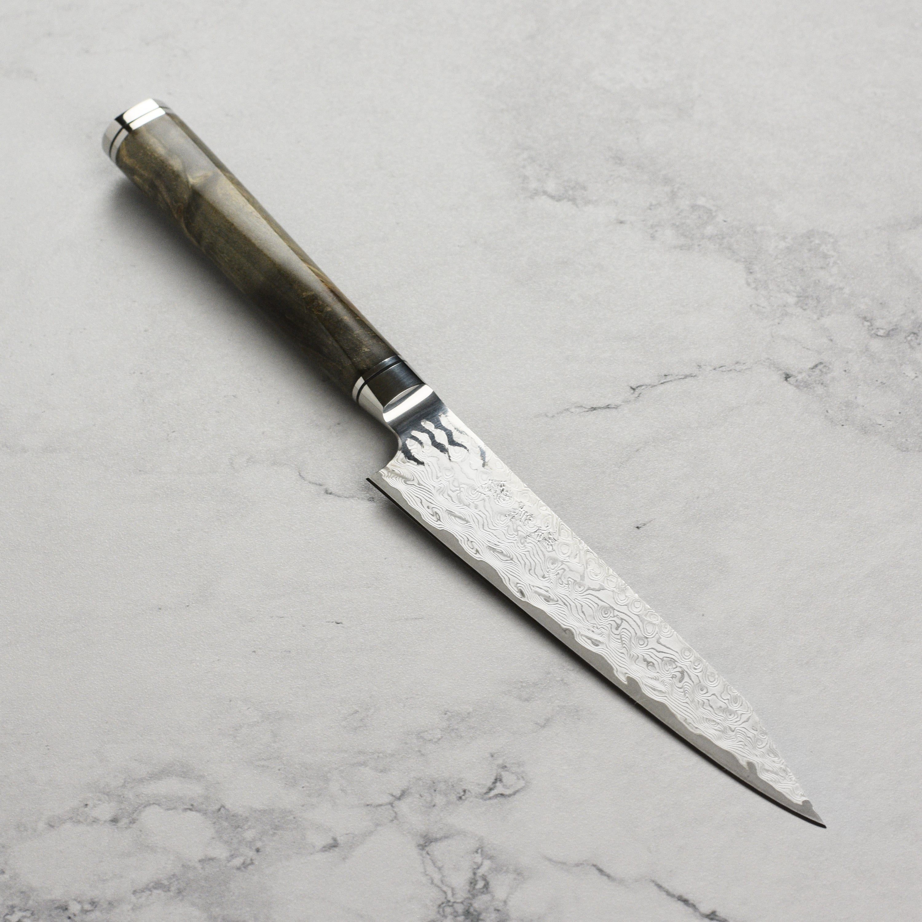 Ryusen Oukoku Ryu 5.3-inch petty knife with Damascus pattern for detailed kitchen tasks