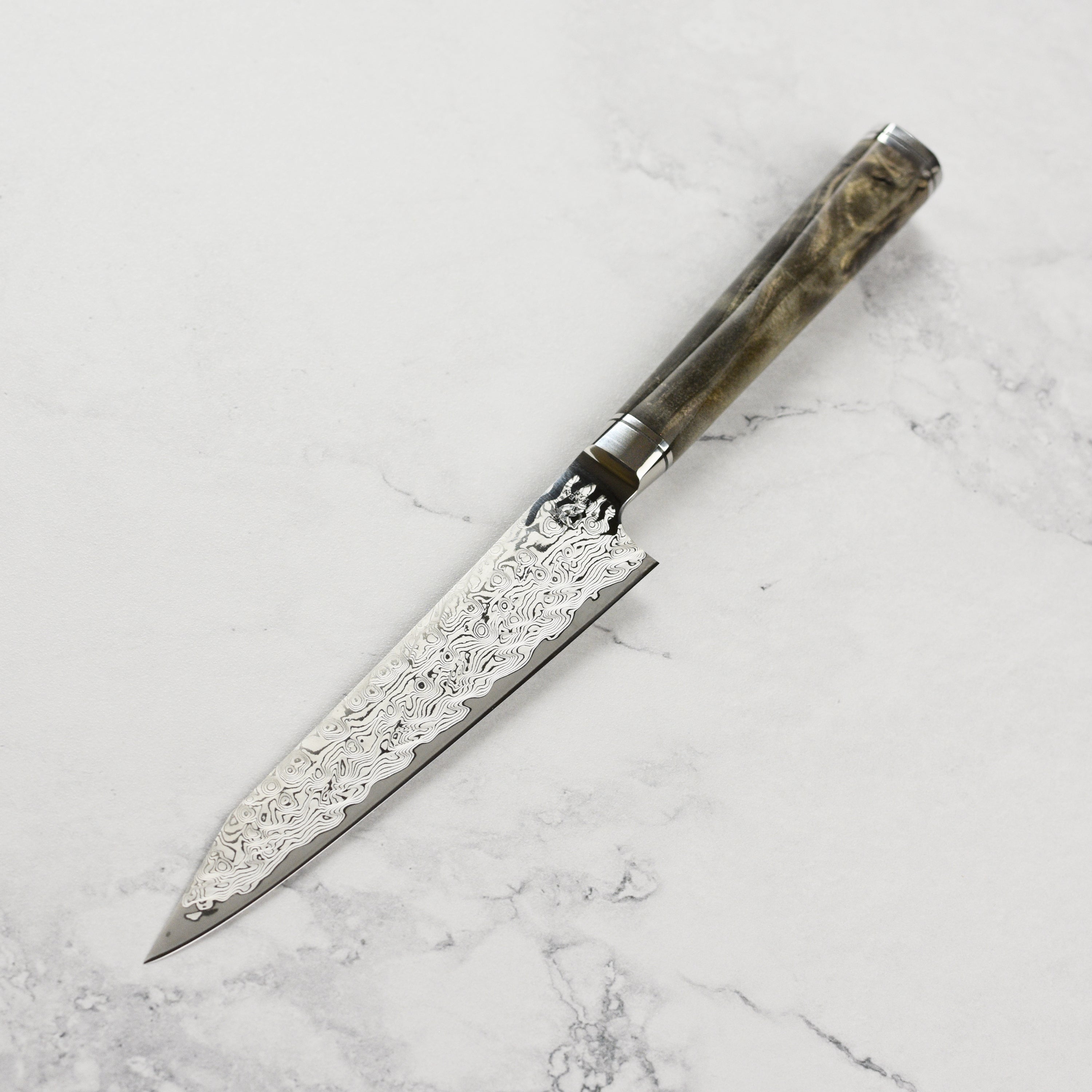 Ryusen Oukoku Ryu 5.3-inch petty knife with Damascus pattern for detailed kitchen tasks