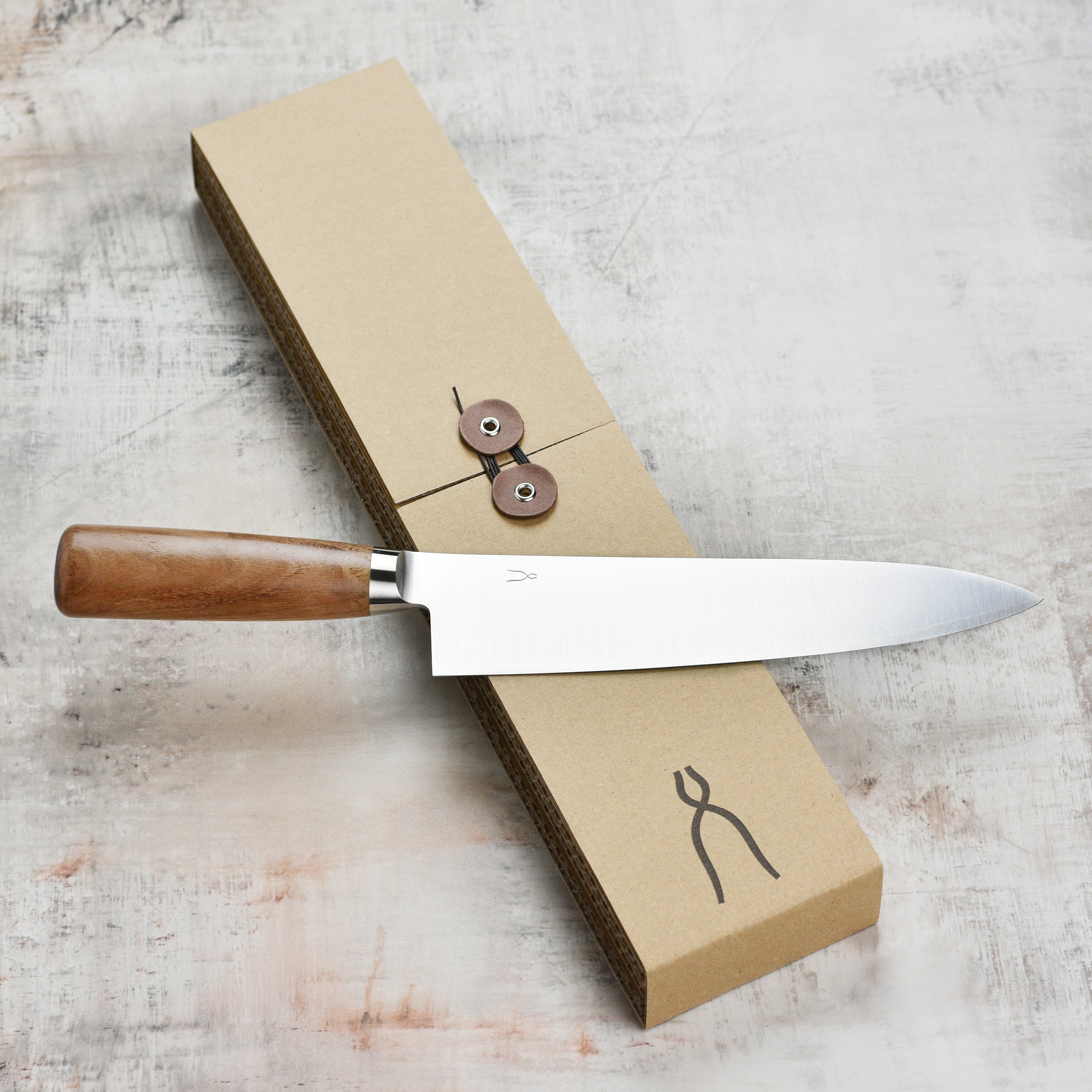 Close-up of the Japanese knifes handle and blade, highlighting quality craftsmanship
