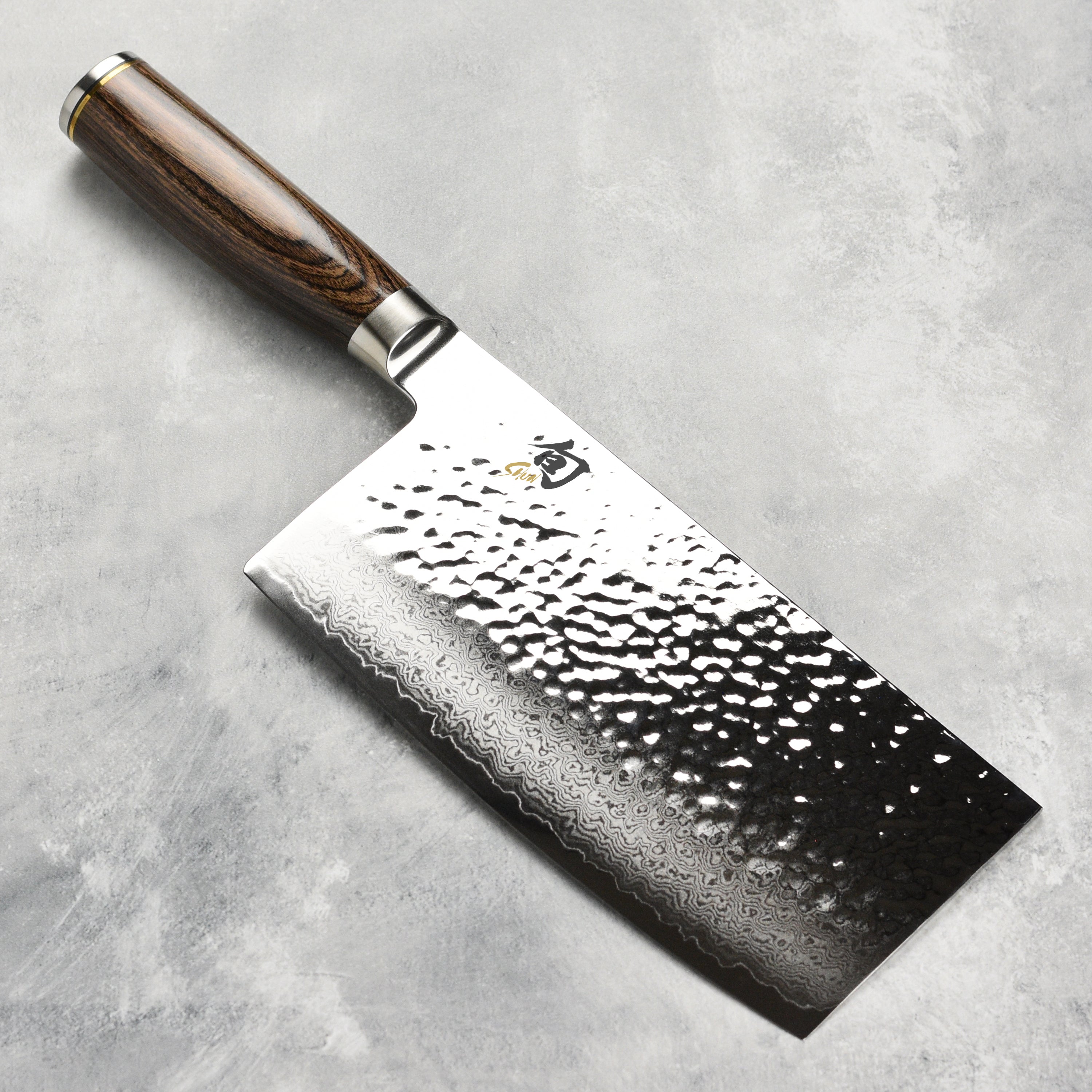 Close-up of Shun Premier 7 inch cleaver blade showing Damascus steel layers