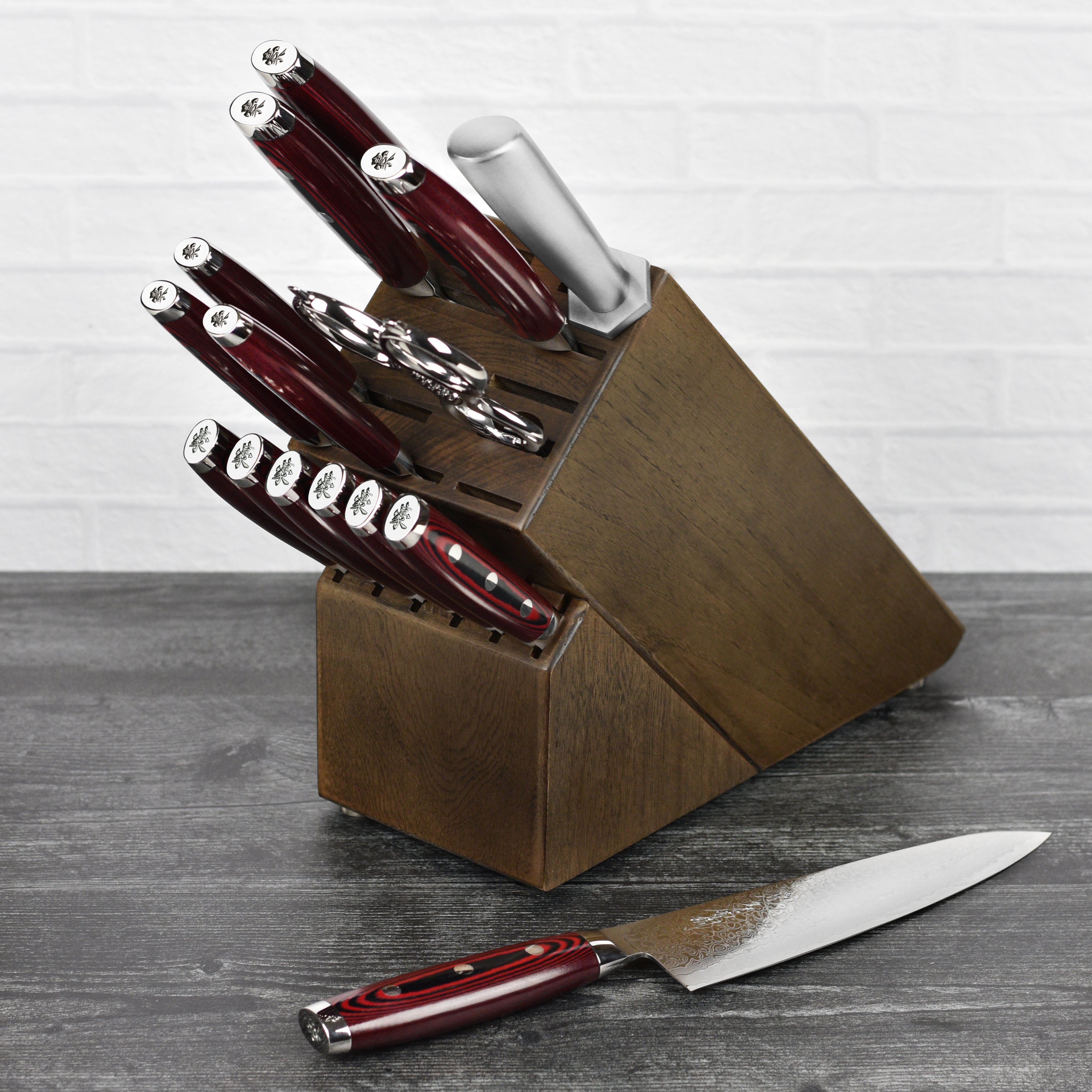 Yaxell 10" honing steel showcasing its stainless steel rod and brushed handle, perfect for professional chefs.