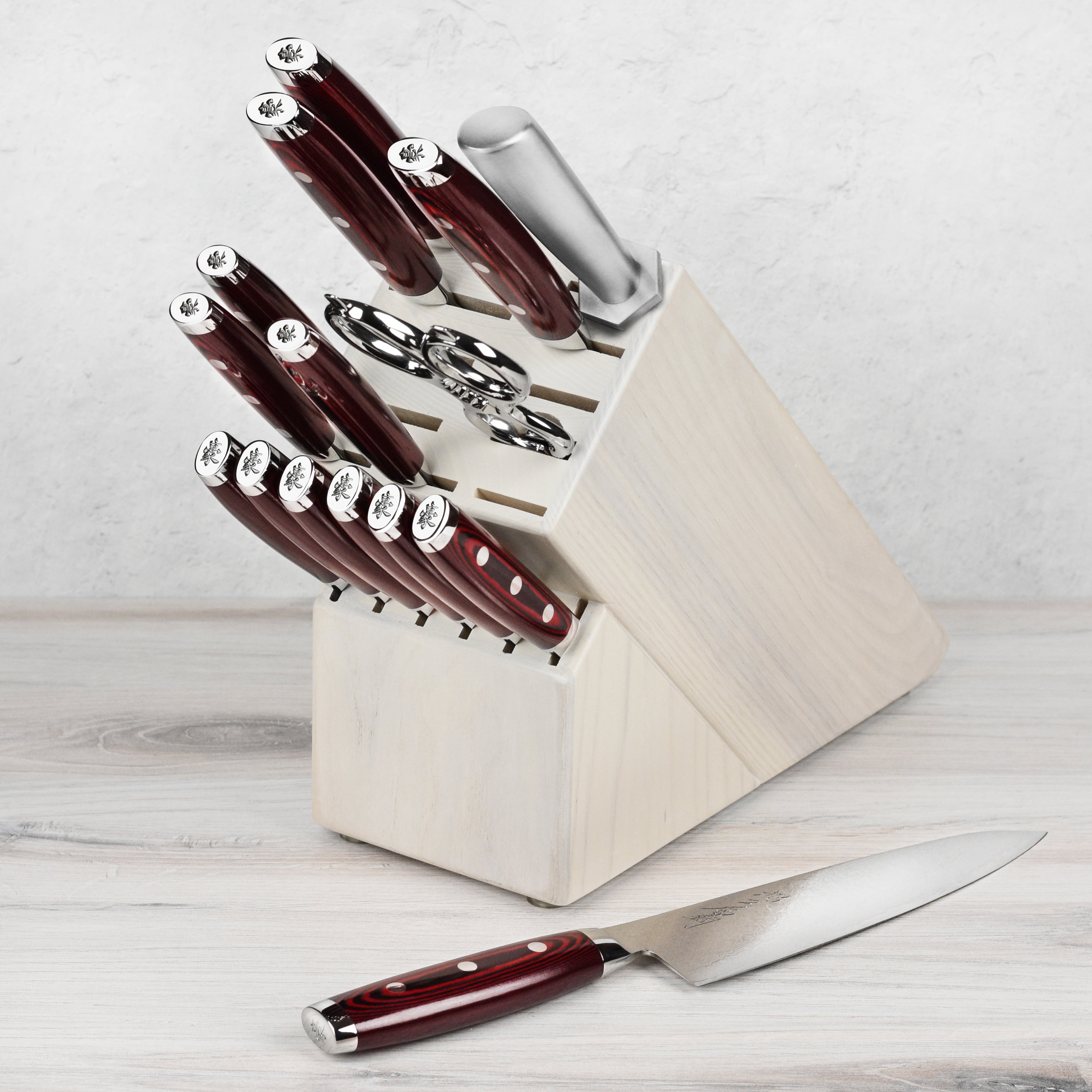 Yaxell Super Gou knife set displayed on a kitchen counter, ideal for home cooks seeking premium kitchen knives.
