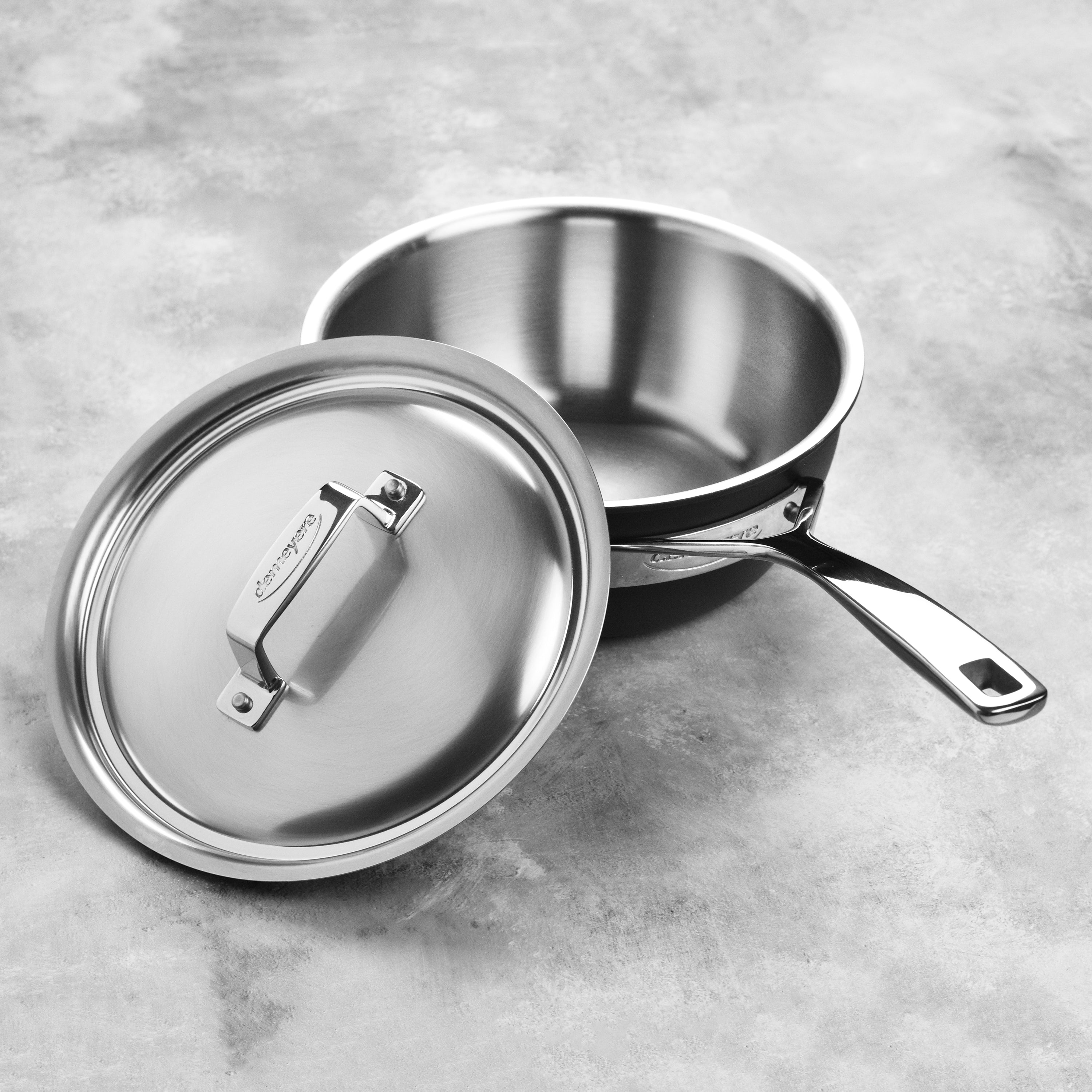 Close-up of the spill-proof pouring rim on the stainless steel saucepan.