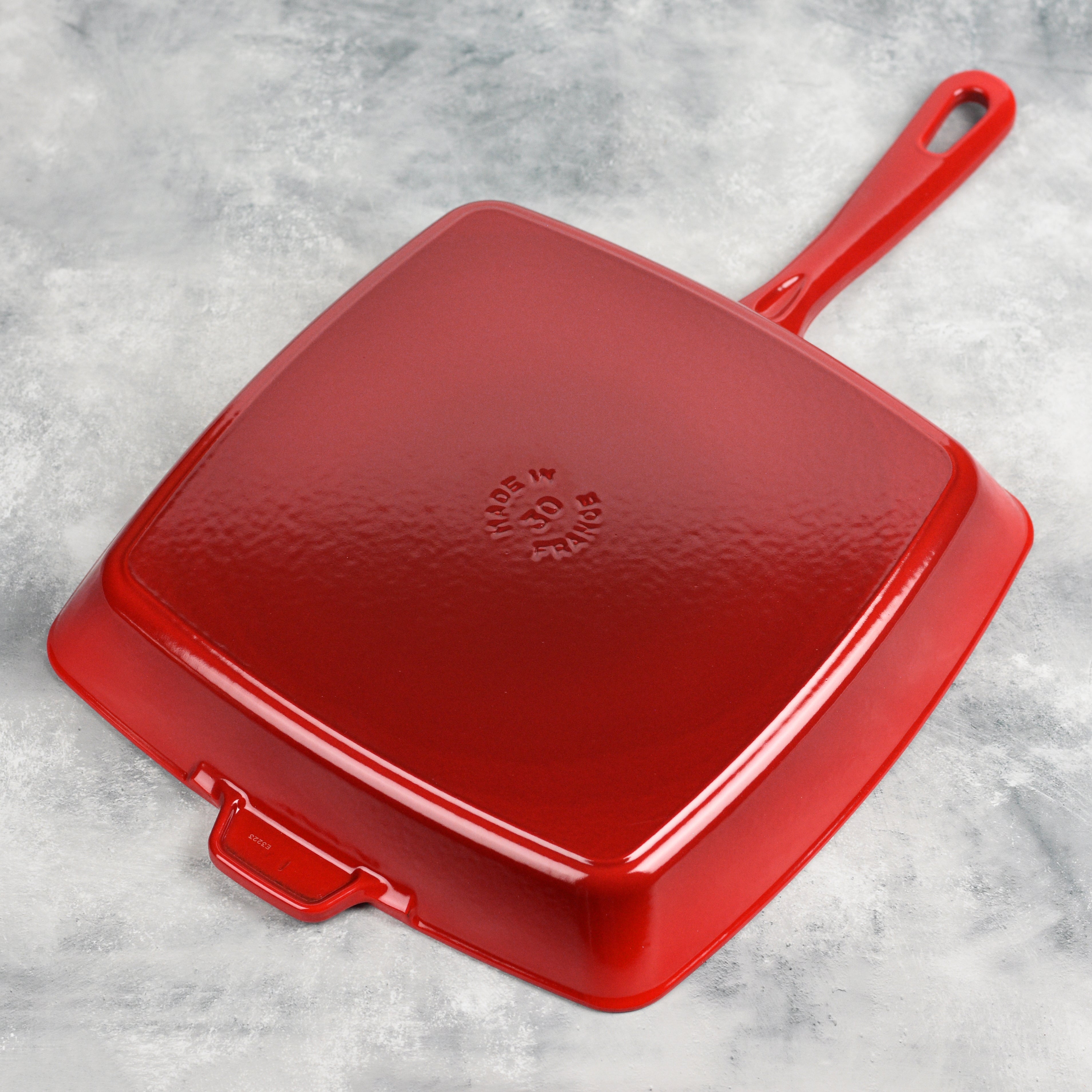 The Staub grill pan in action, grilling vegetables with perfect marks and even heat distribution.