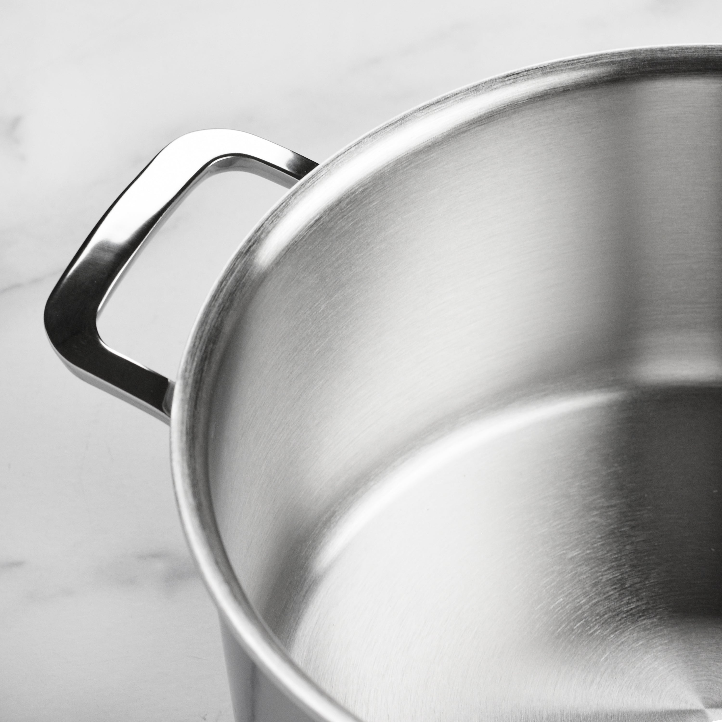 Demeyere Dutch Oven in use on an induction stove, demonstrating its compatibility and performance.