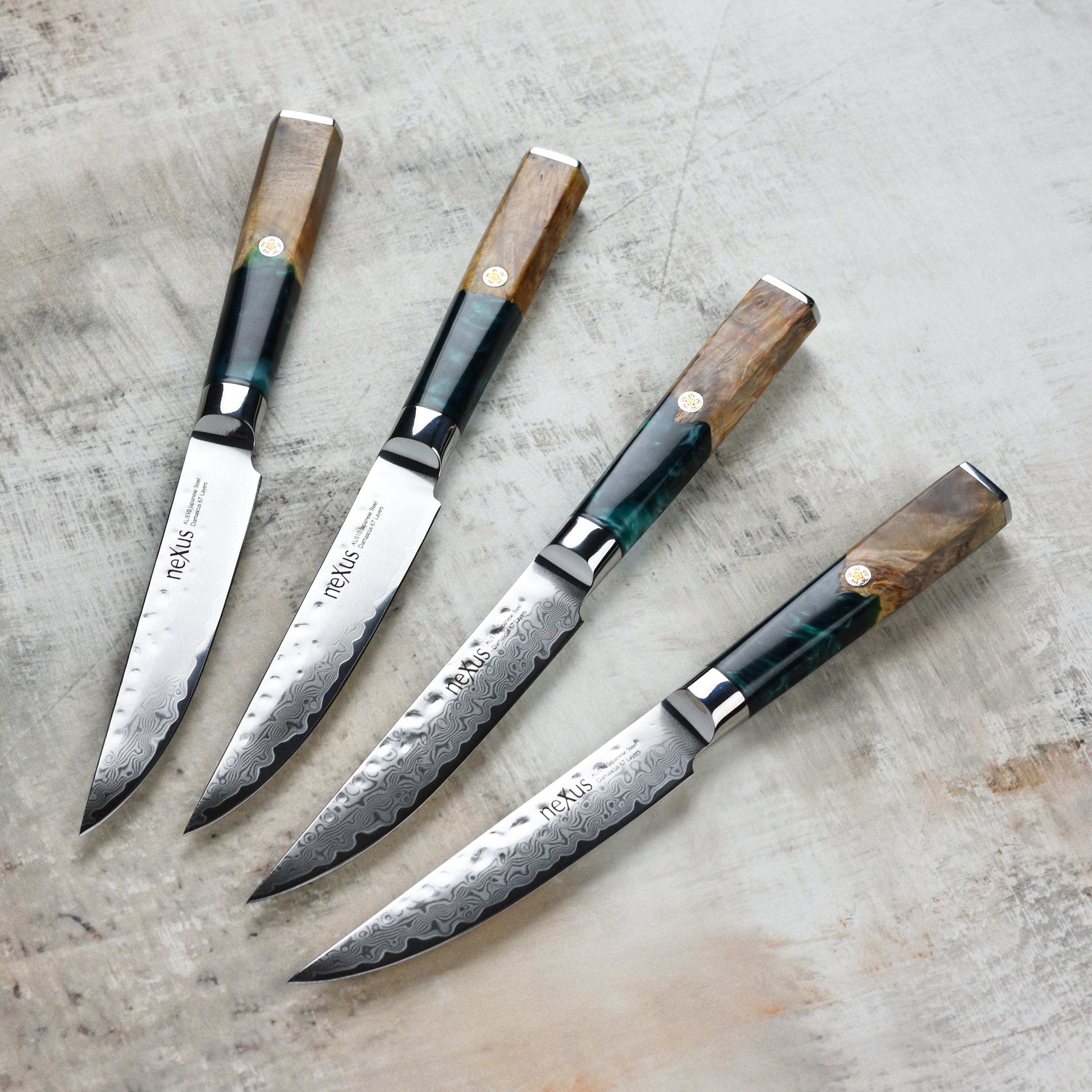 Close-up of Damascus blades with hammered finish and mosaic pins