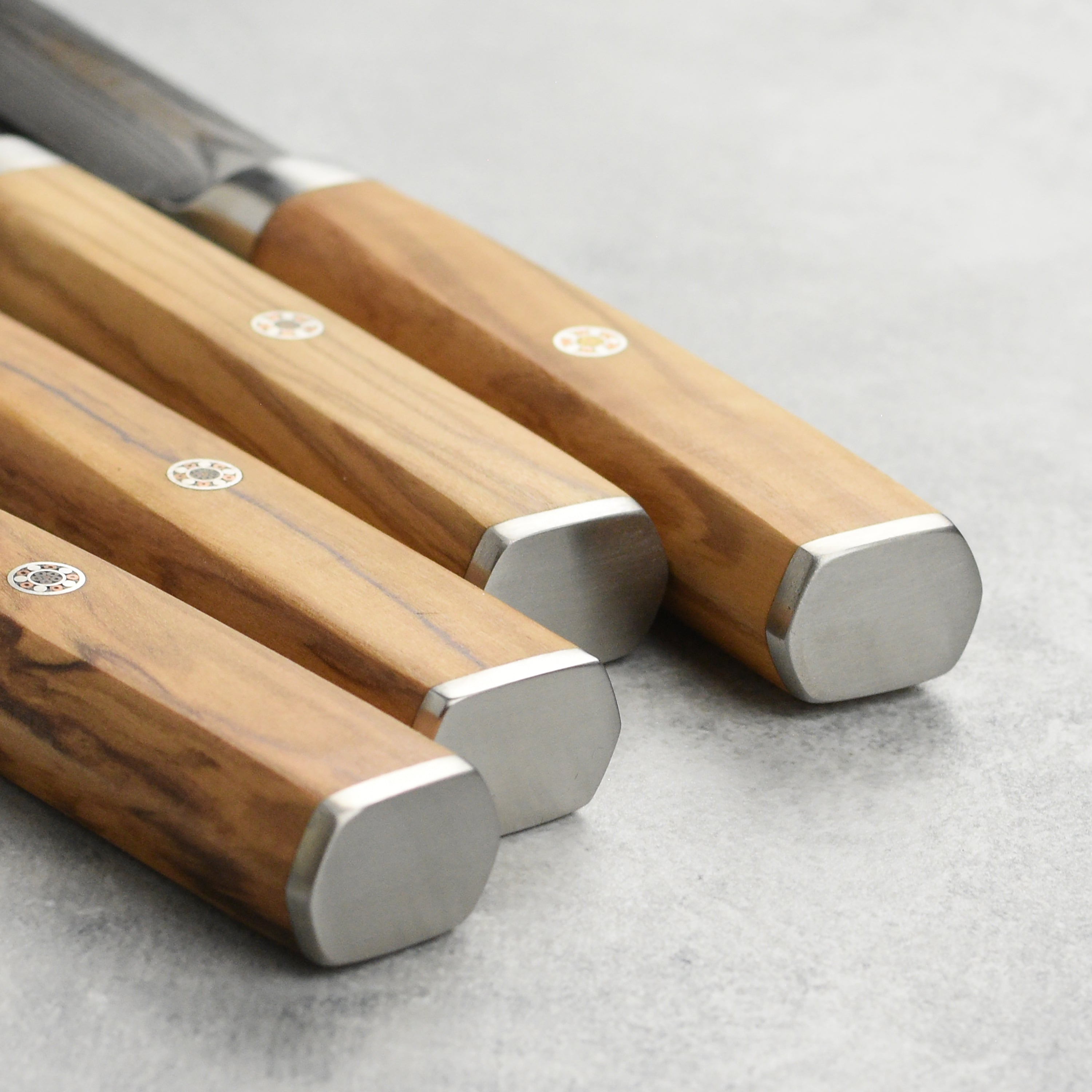 Acacia wood storage case containing the luxury steak knife set.
