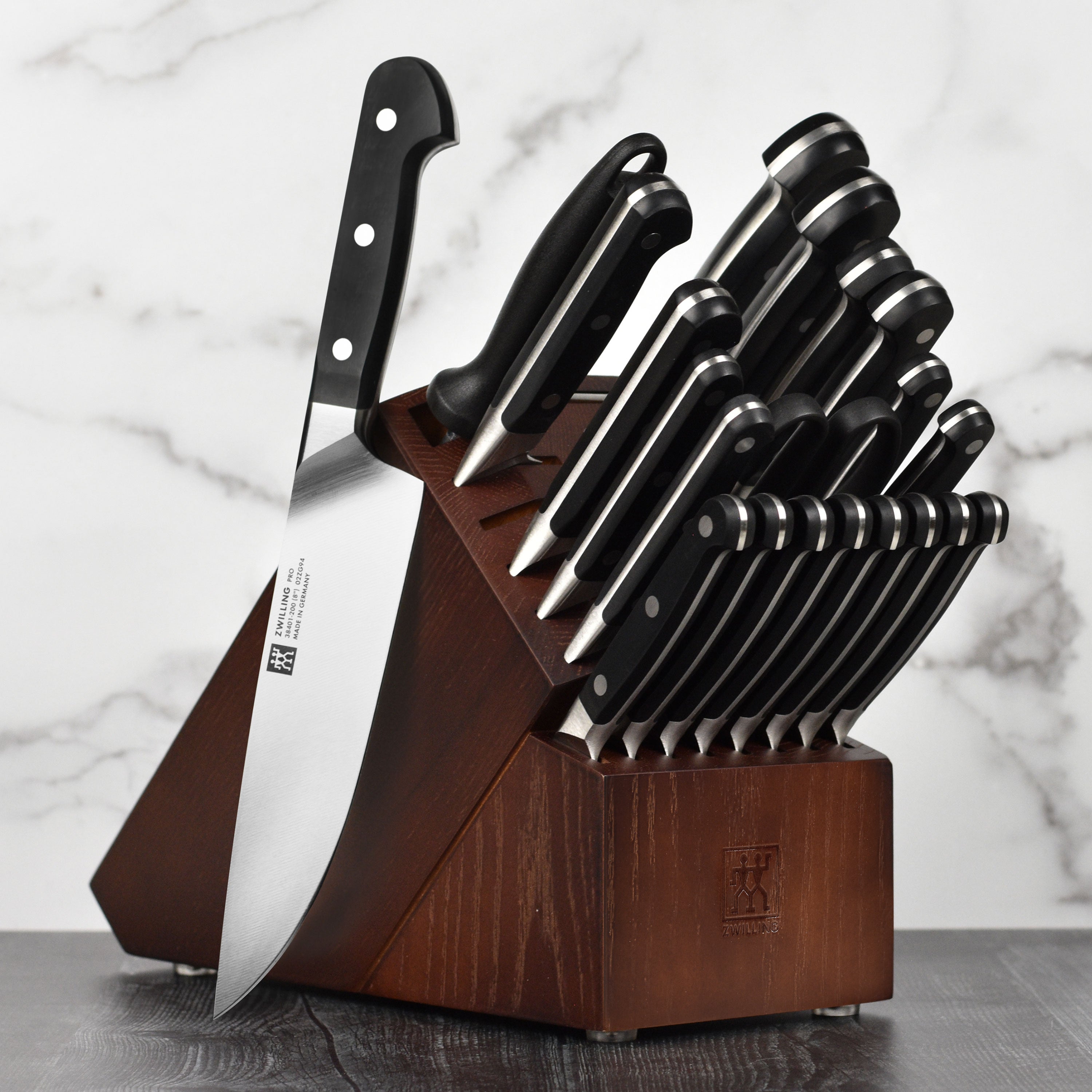 Side view of the Zwilling Pro knife block set showcasing the high carbon steel knives and steak knives.