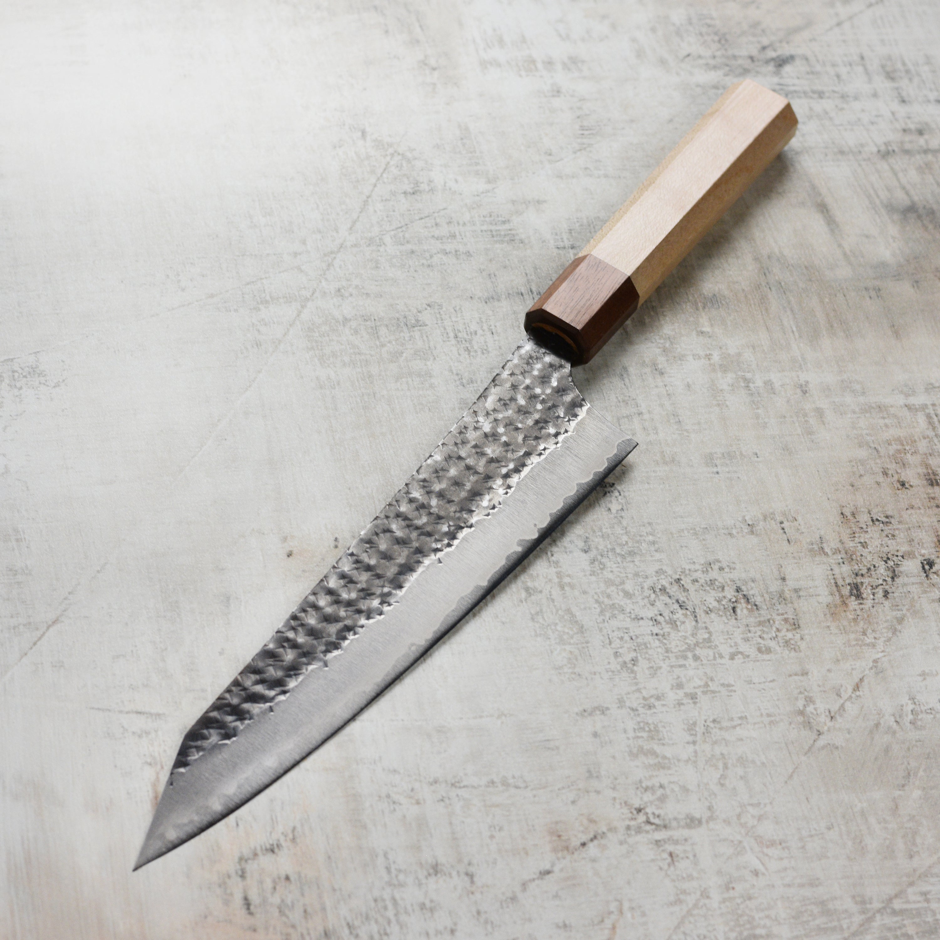 Close-up of the aogami super steel blade of the Kurosaki chef knife.