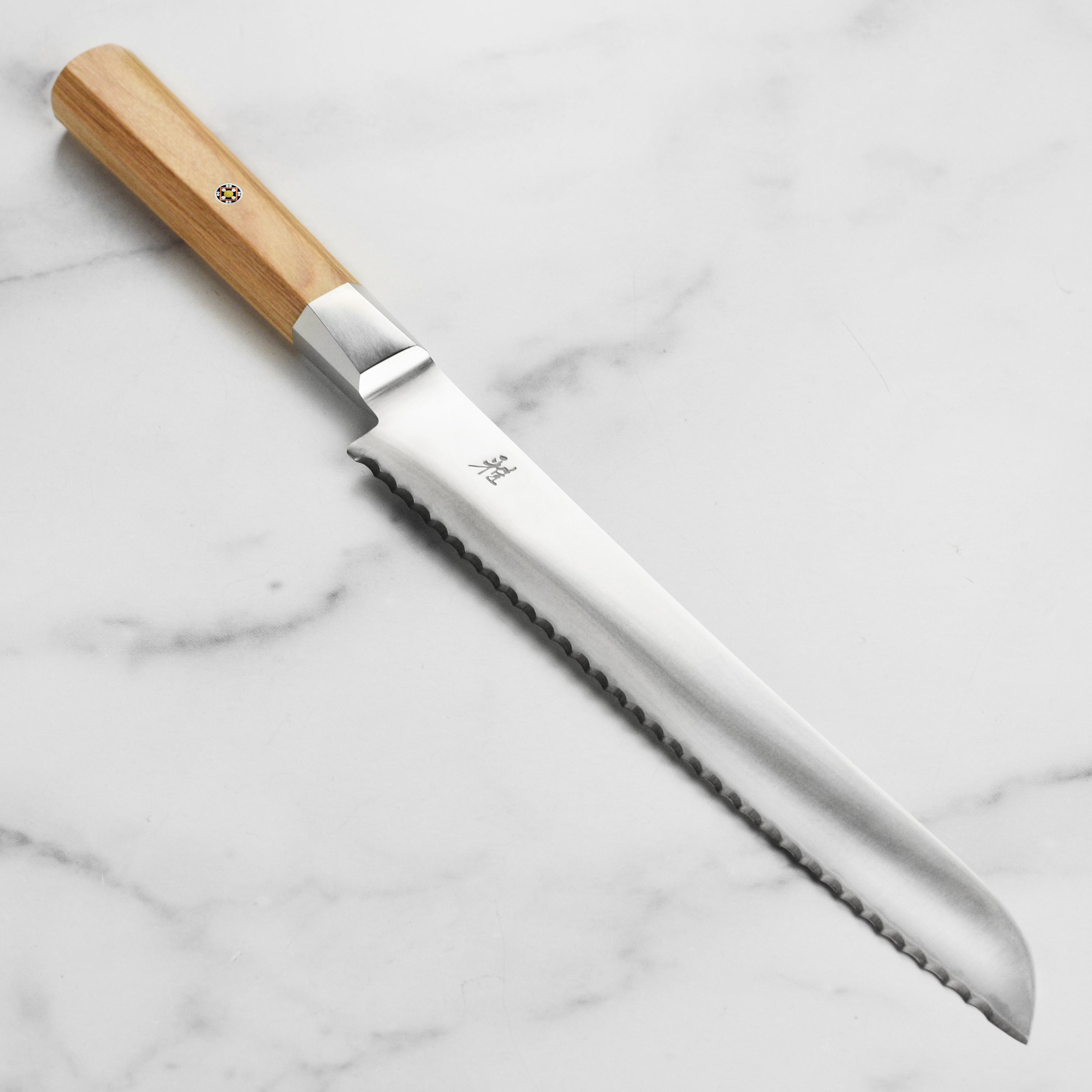 Miyabi Koya 9-inch Japanese bread knife with detailed blade and handle