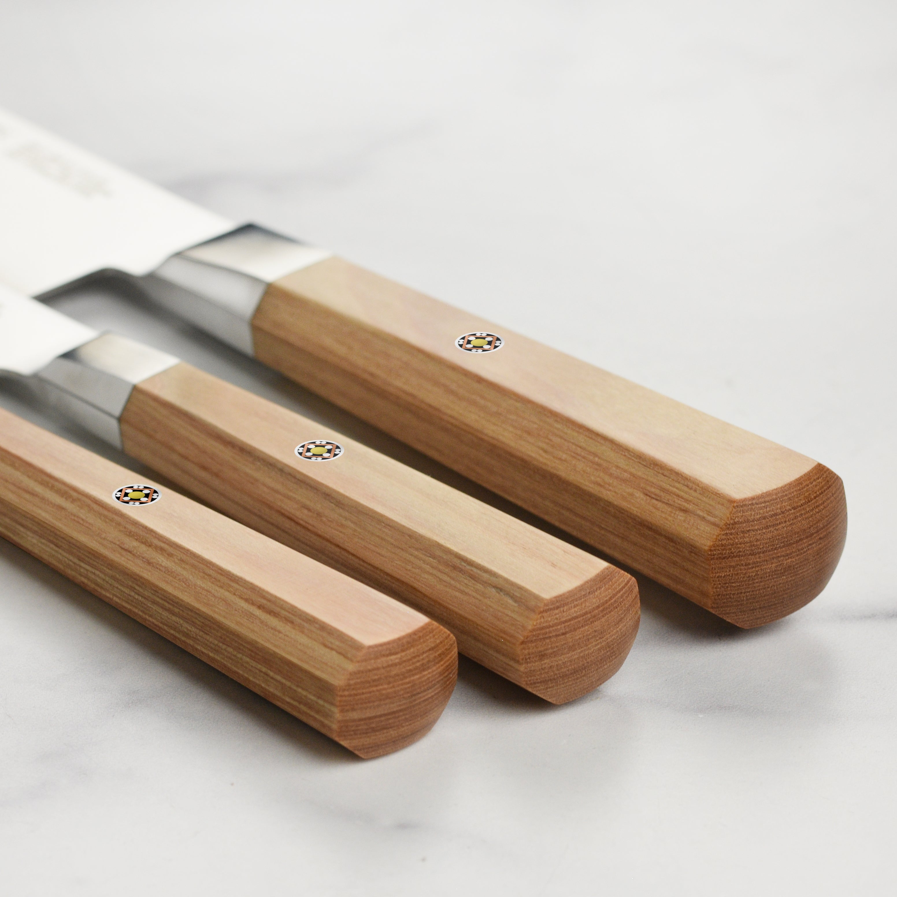 Close-up of the Miyabi Koya knife showcasing its sharp blade and intricate design.