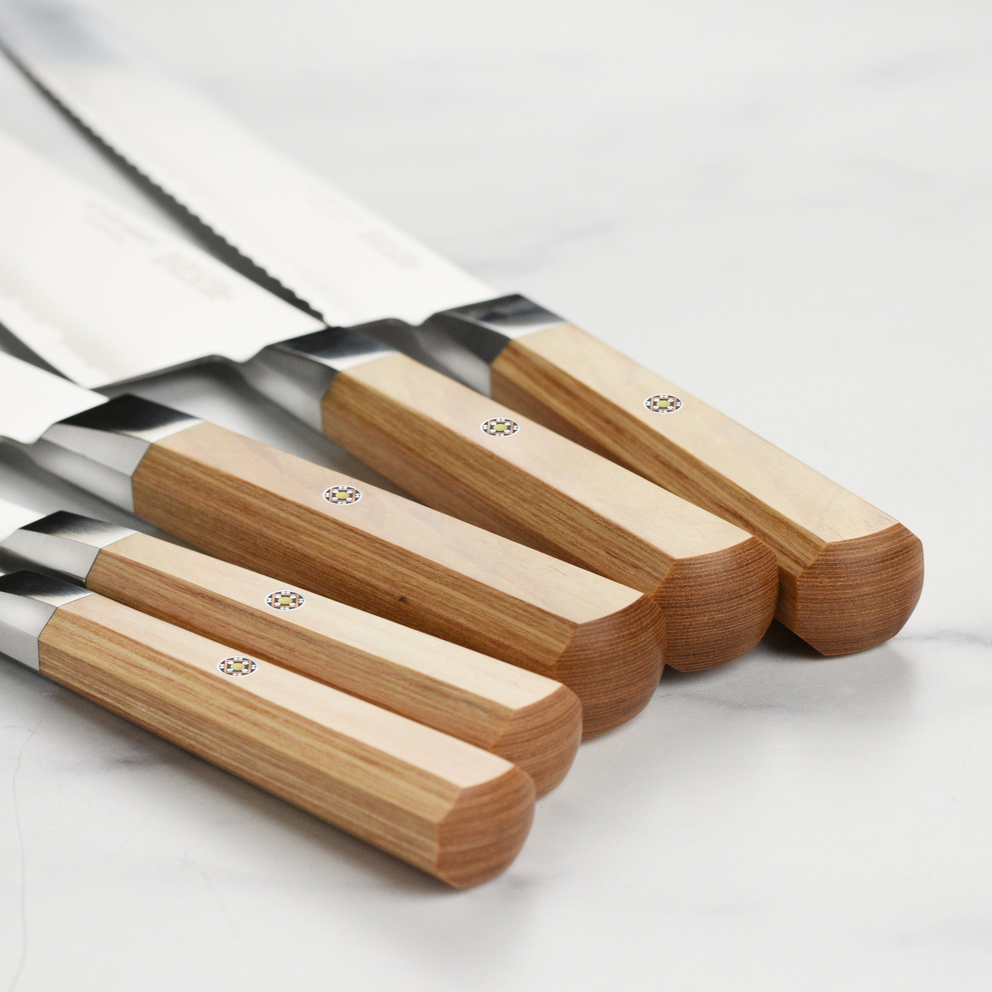 Miyabi Koya 6-piece magnetic knife set arranged on a modern kitchen counter, showcasing Japanese craftsmanship.