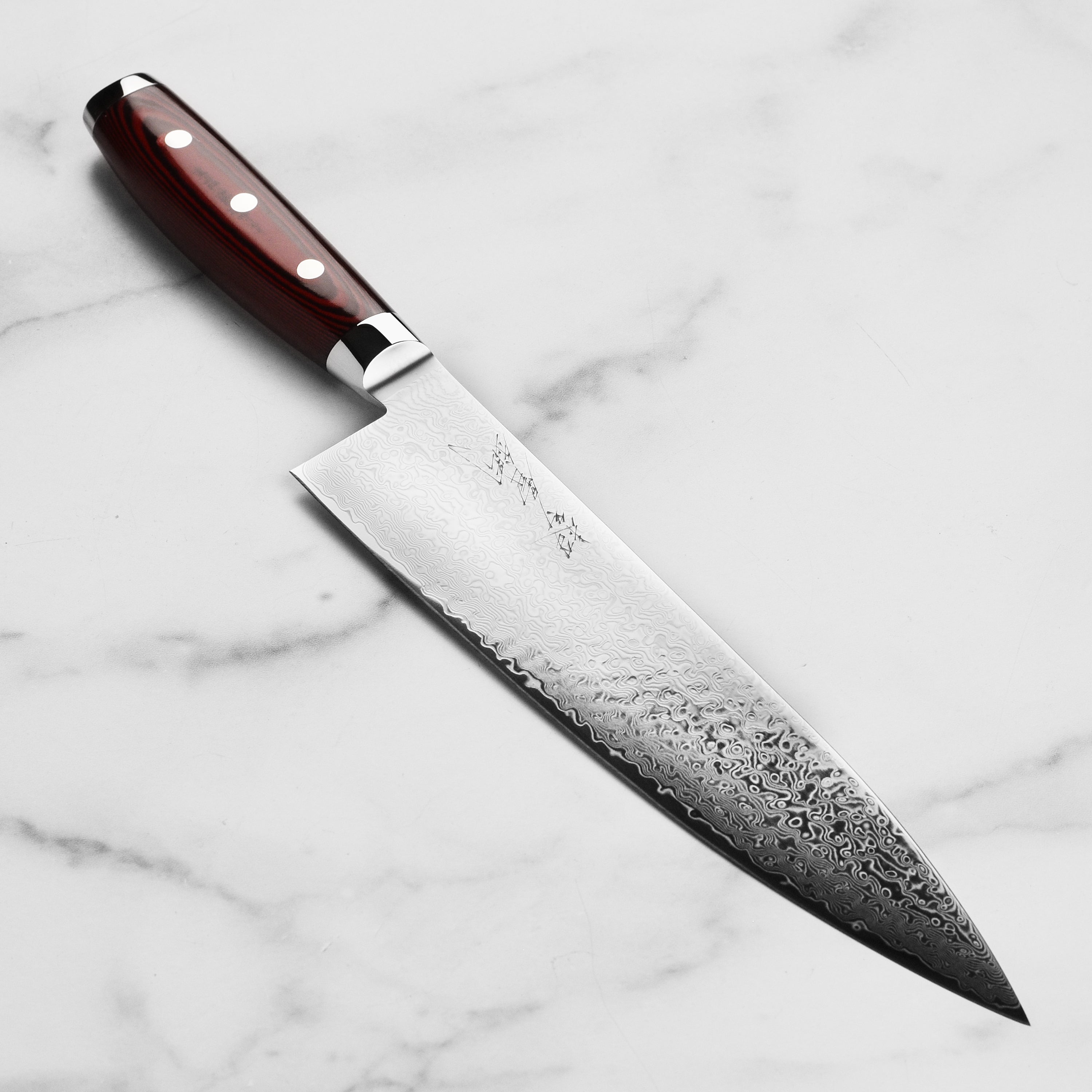 Yaxell Super Gou SG2 Japanese chef's knife with layered steel blade and handle