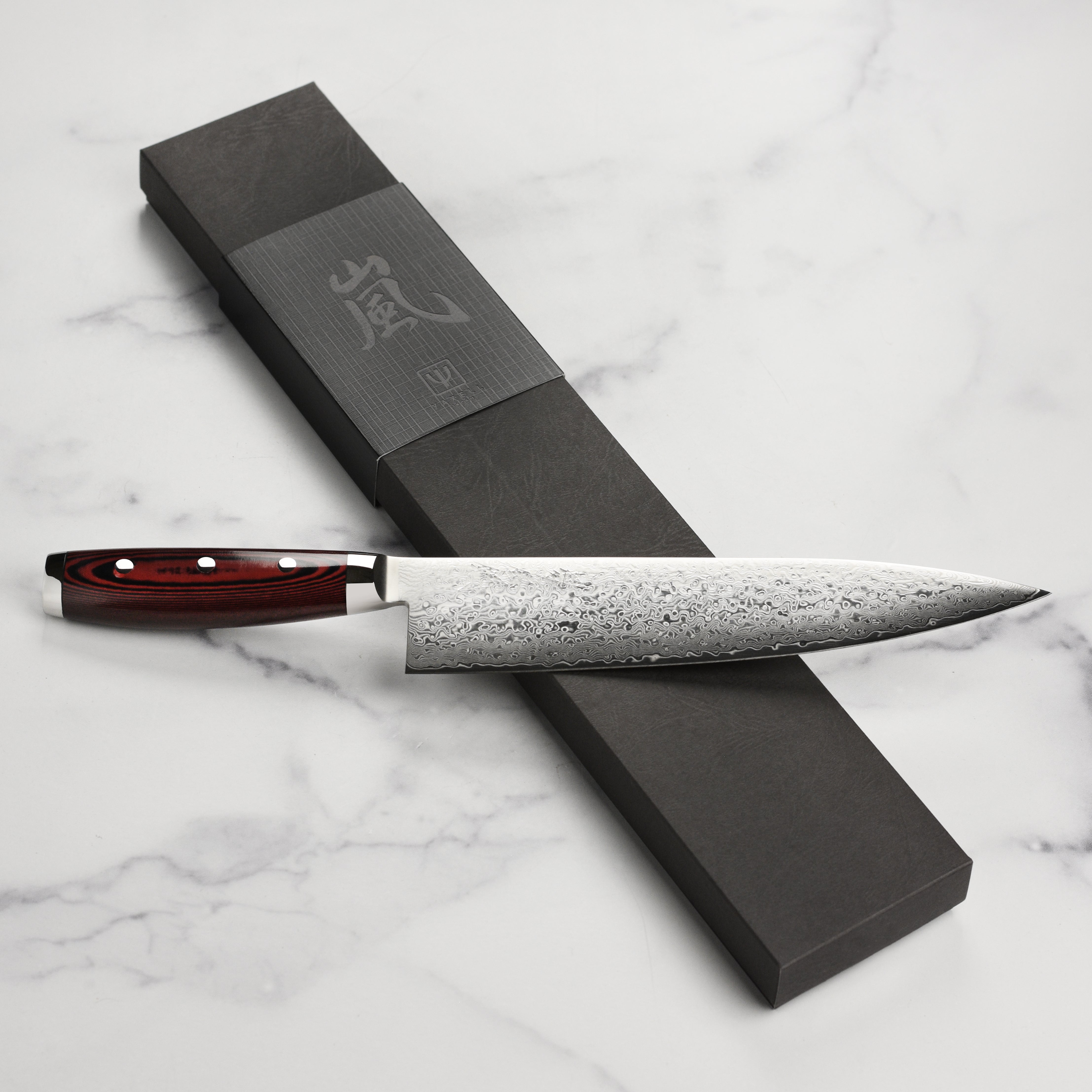 Yaxell Super Gou SG2 Japanese chefs knife with layered steel blade and handle