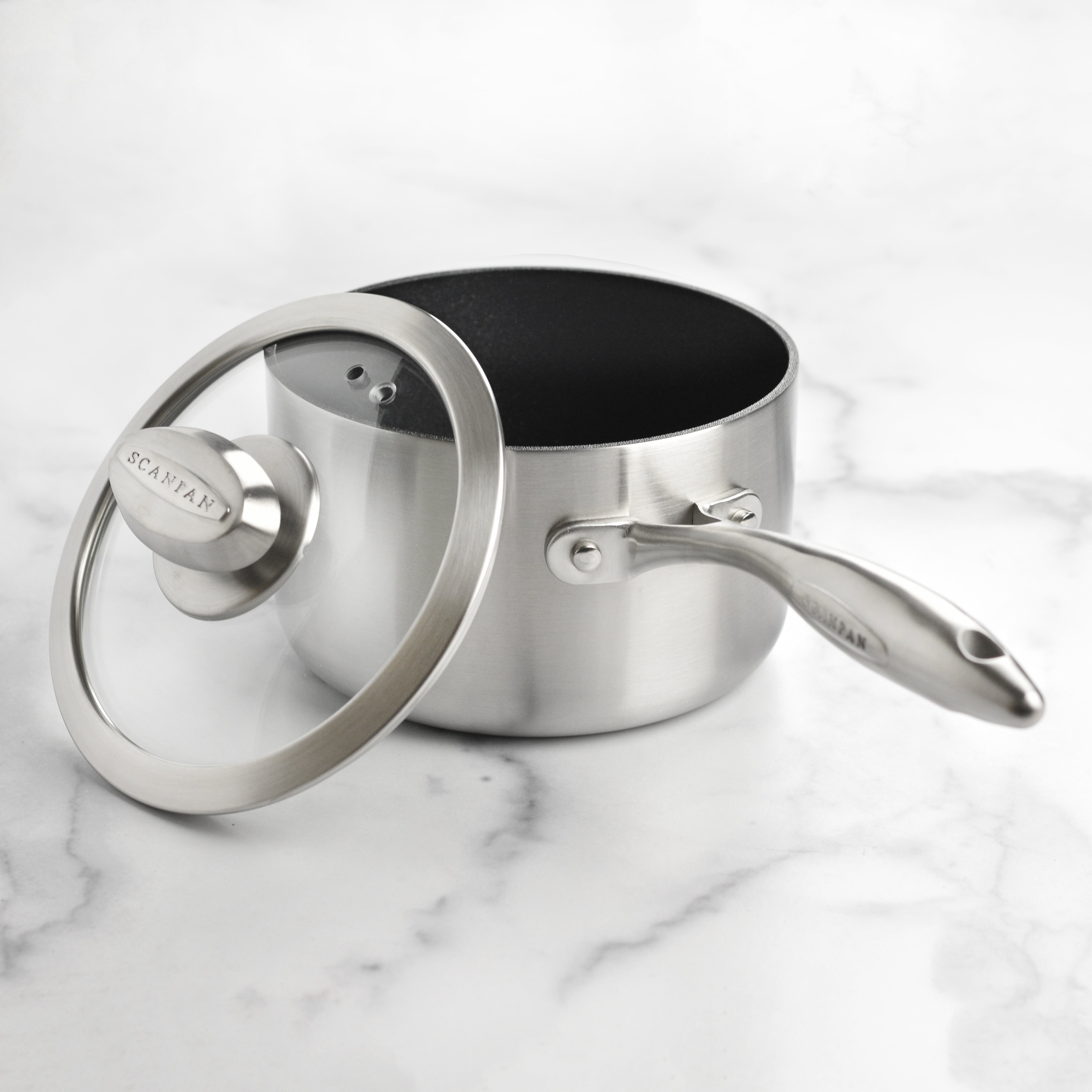 View of the Scanpan CX+ 2-quart durable nonstick saucepan with glass lid, highlighting its elegant design and sturdy construction.
