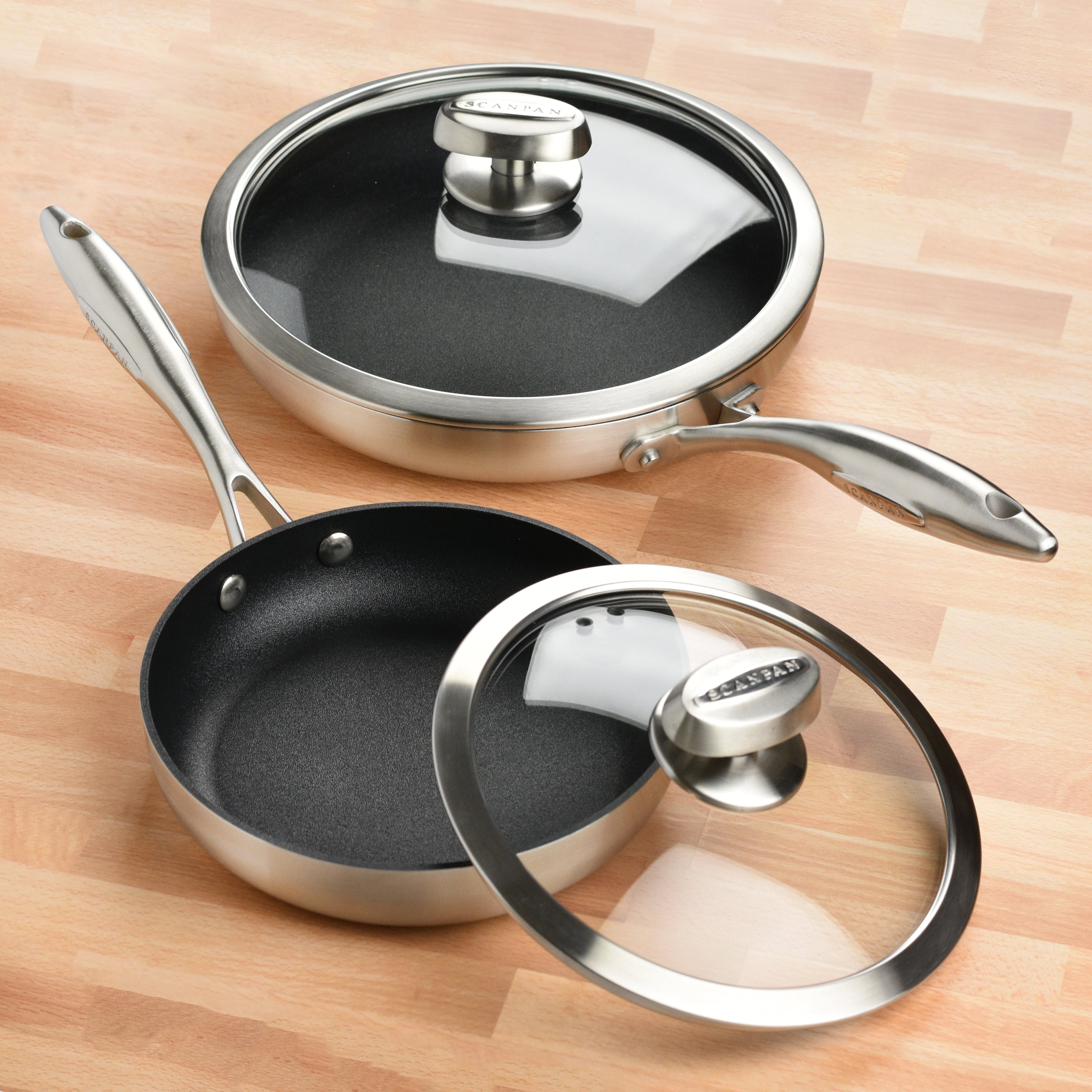 The stainless steel nonstick fry pan set in use, demonstrating even cooking on an induction stovetop.